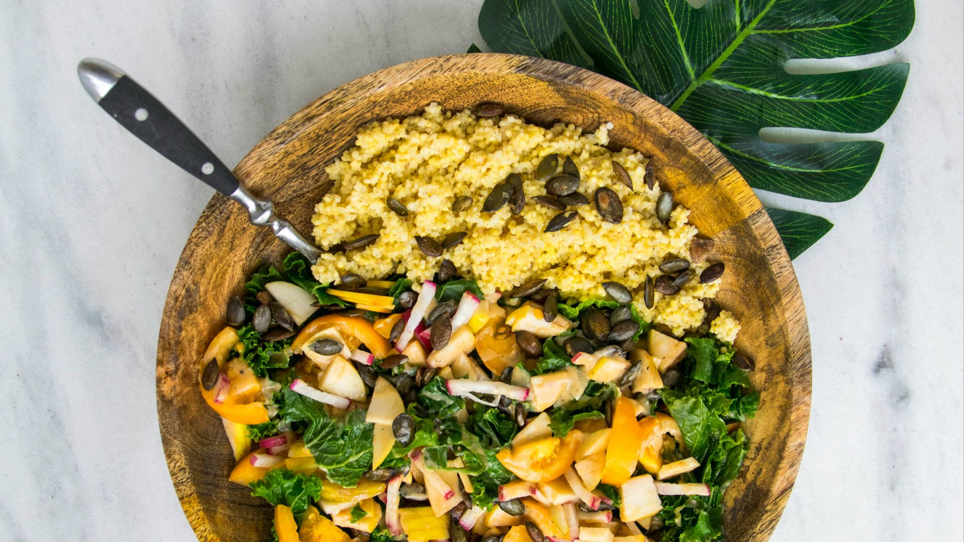 cooked rice with vegetable salad in brown wooden bowl