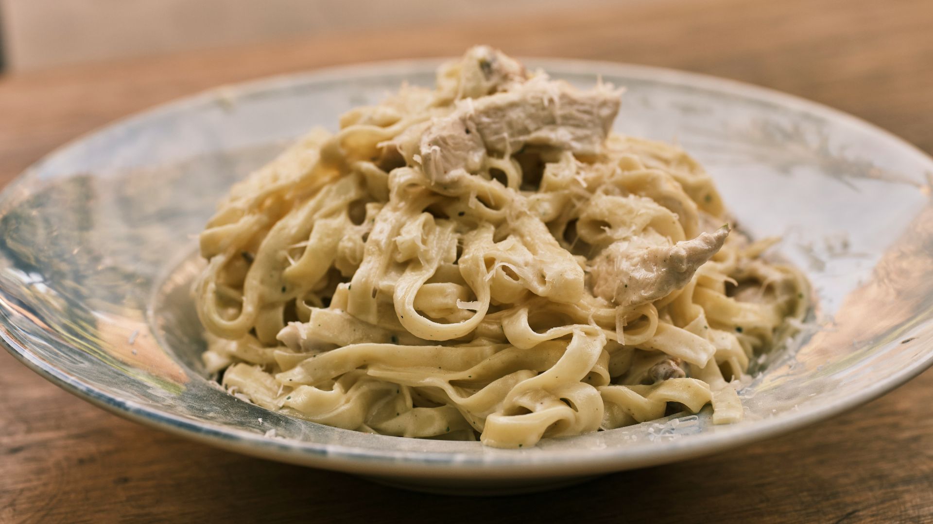 a plate of food on a wooden table