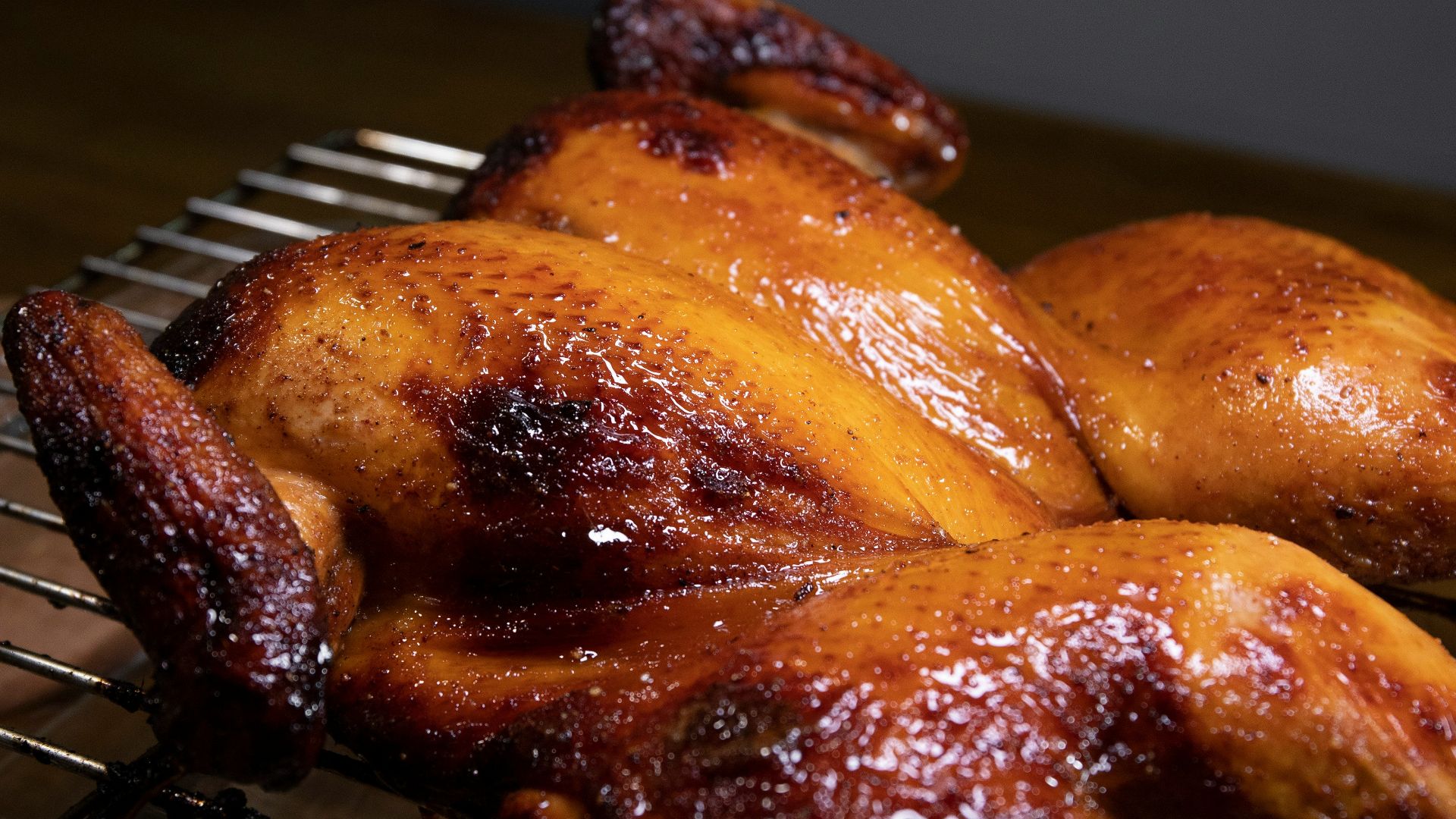 roasted chicken on black metal grill