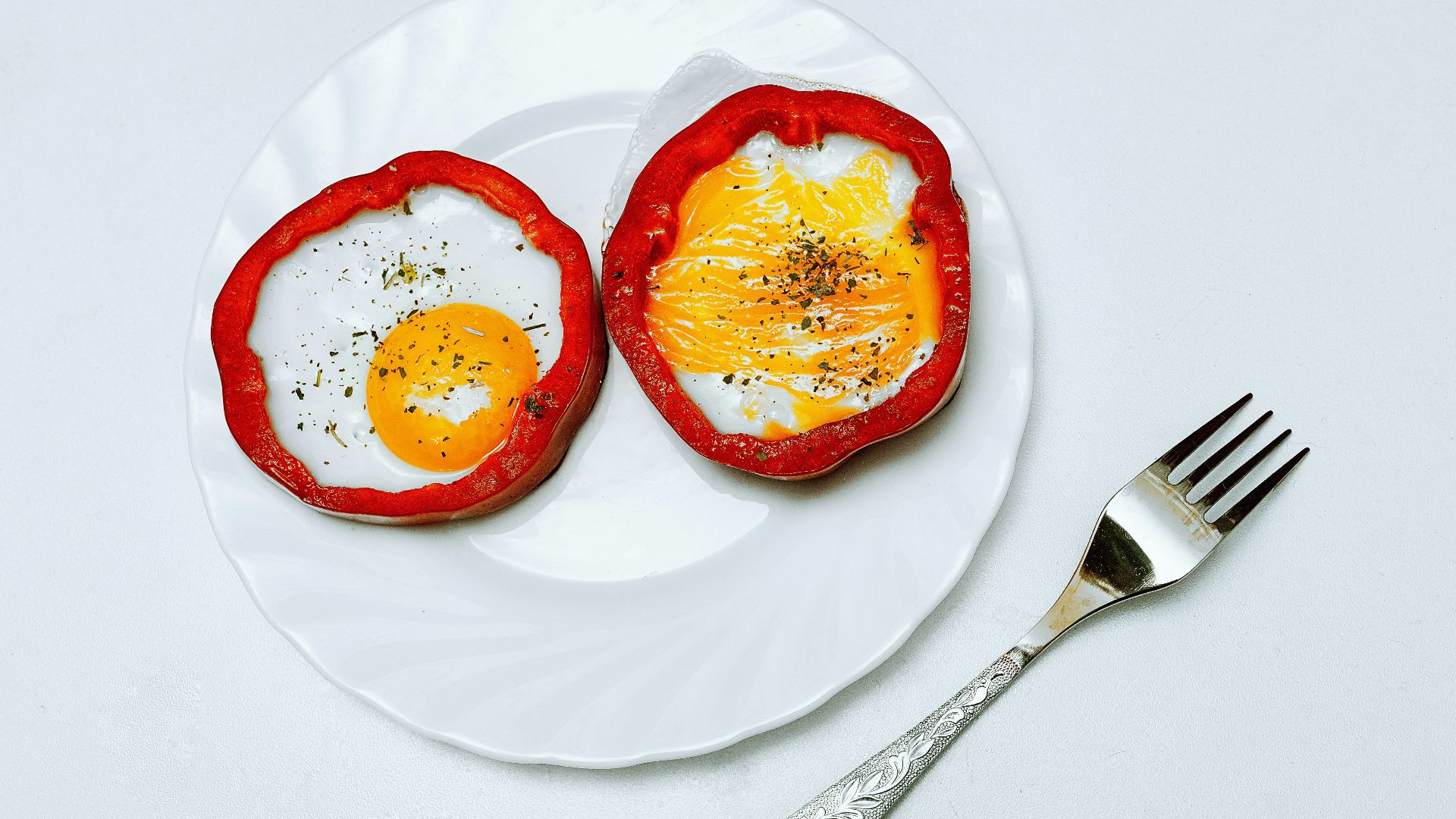 egg in red plastic container