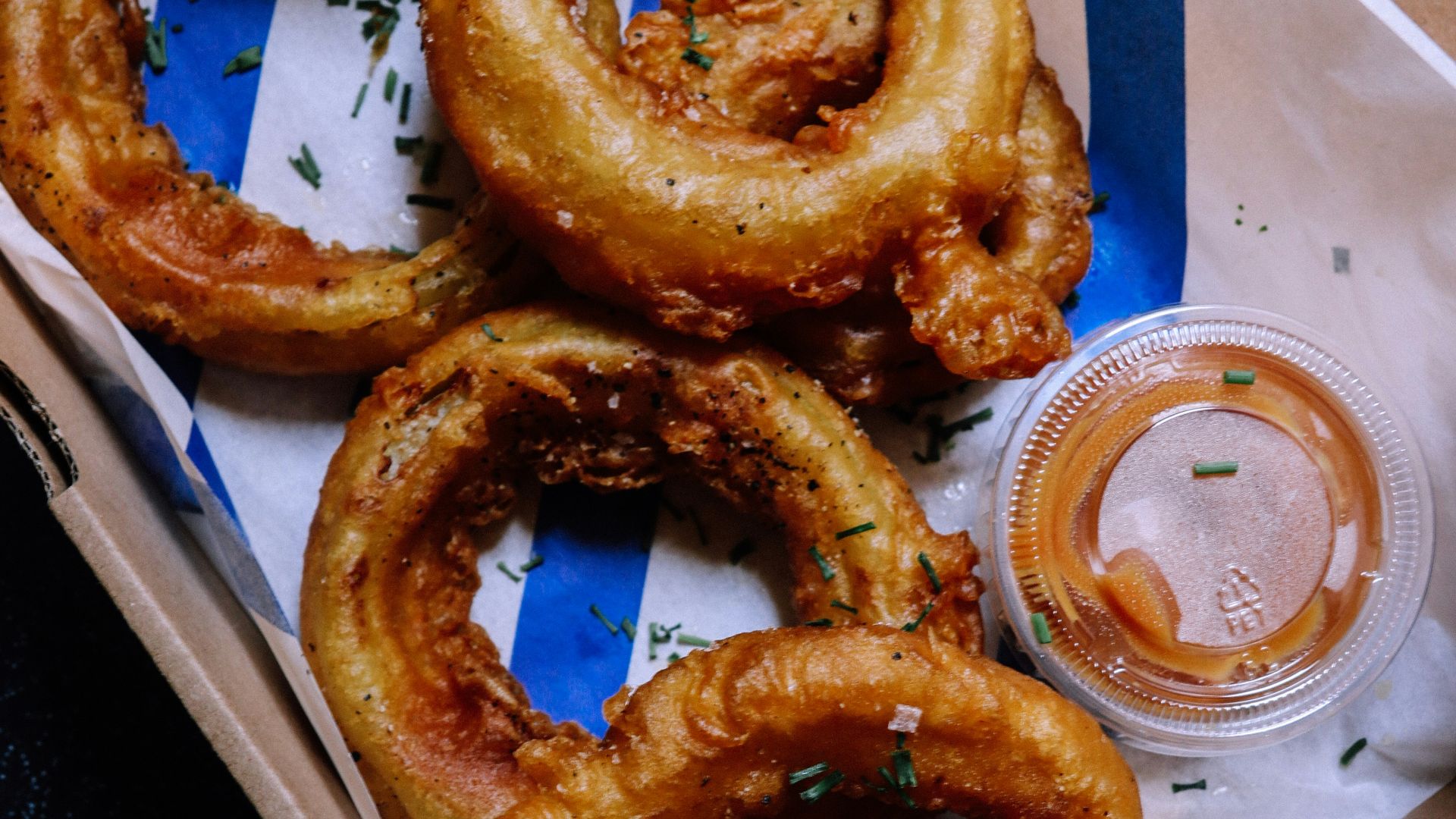 onion rings on white paper