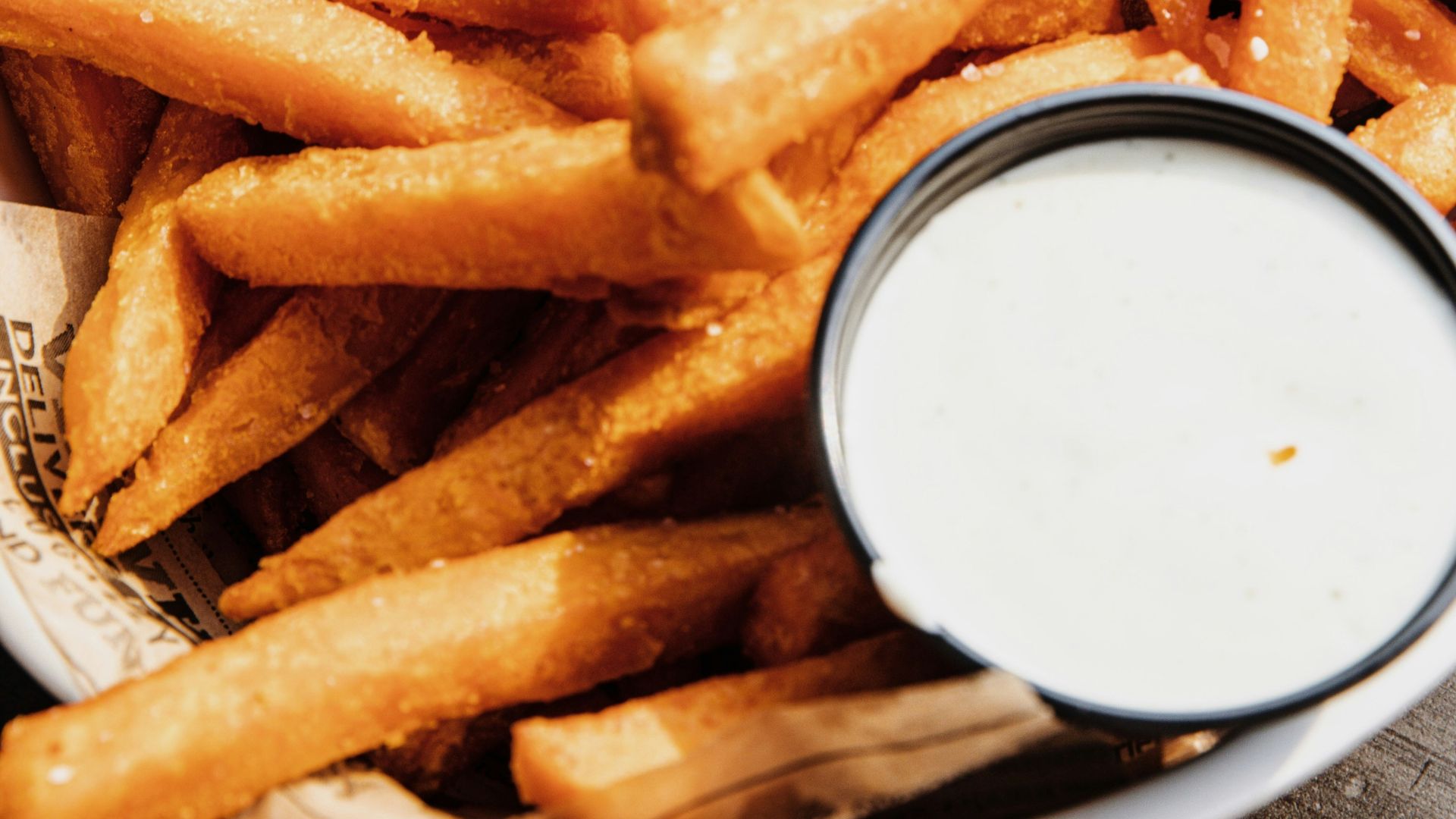 fried fries on white paper
