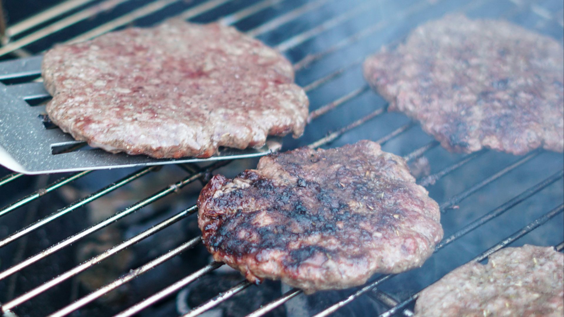 brown meat on black grill