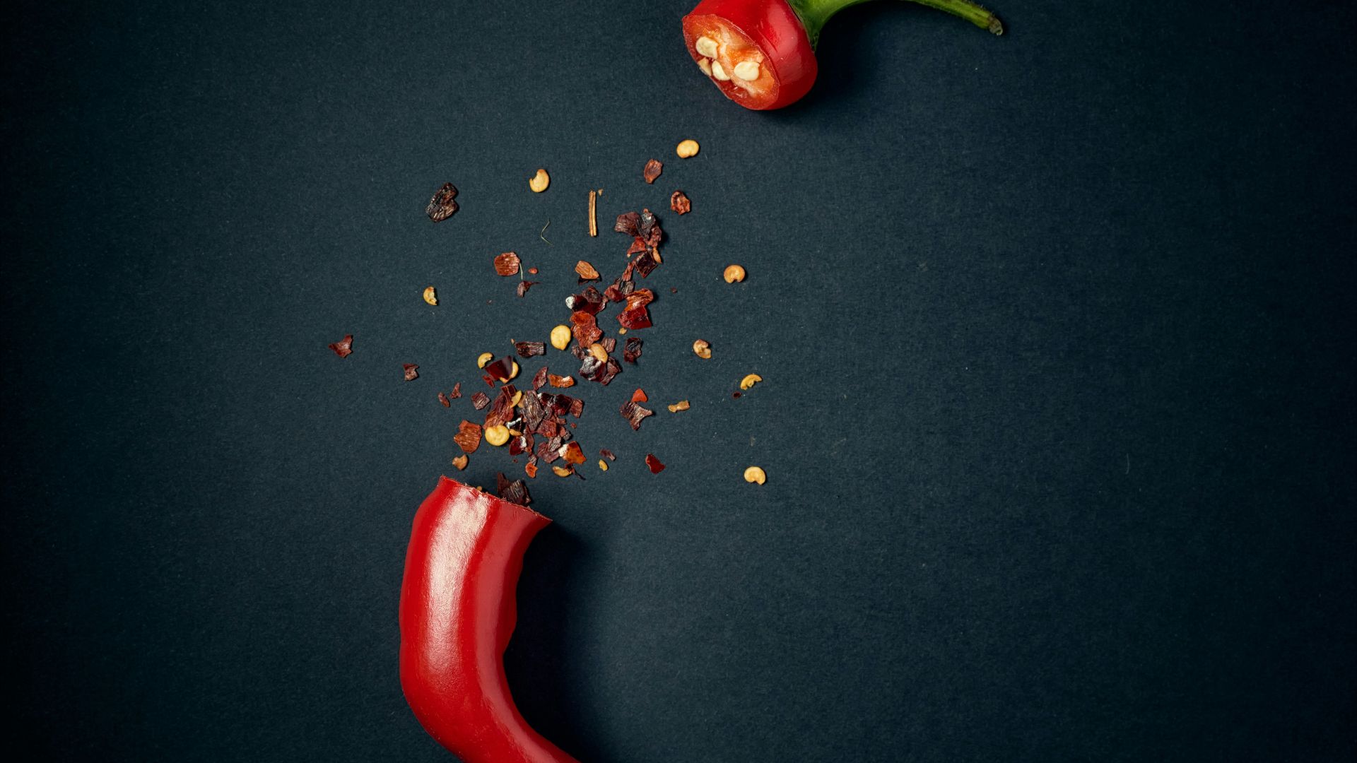 red chili pepper with green leaves