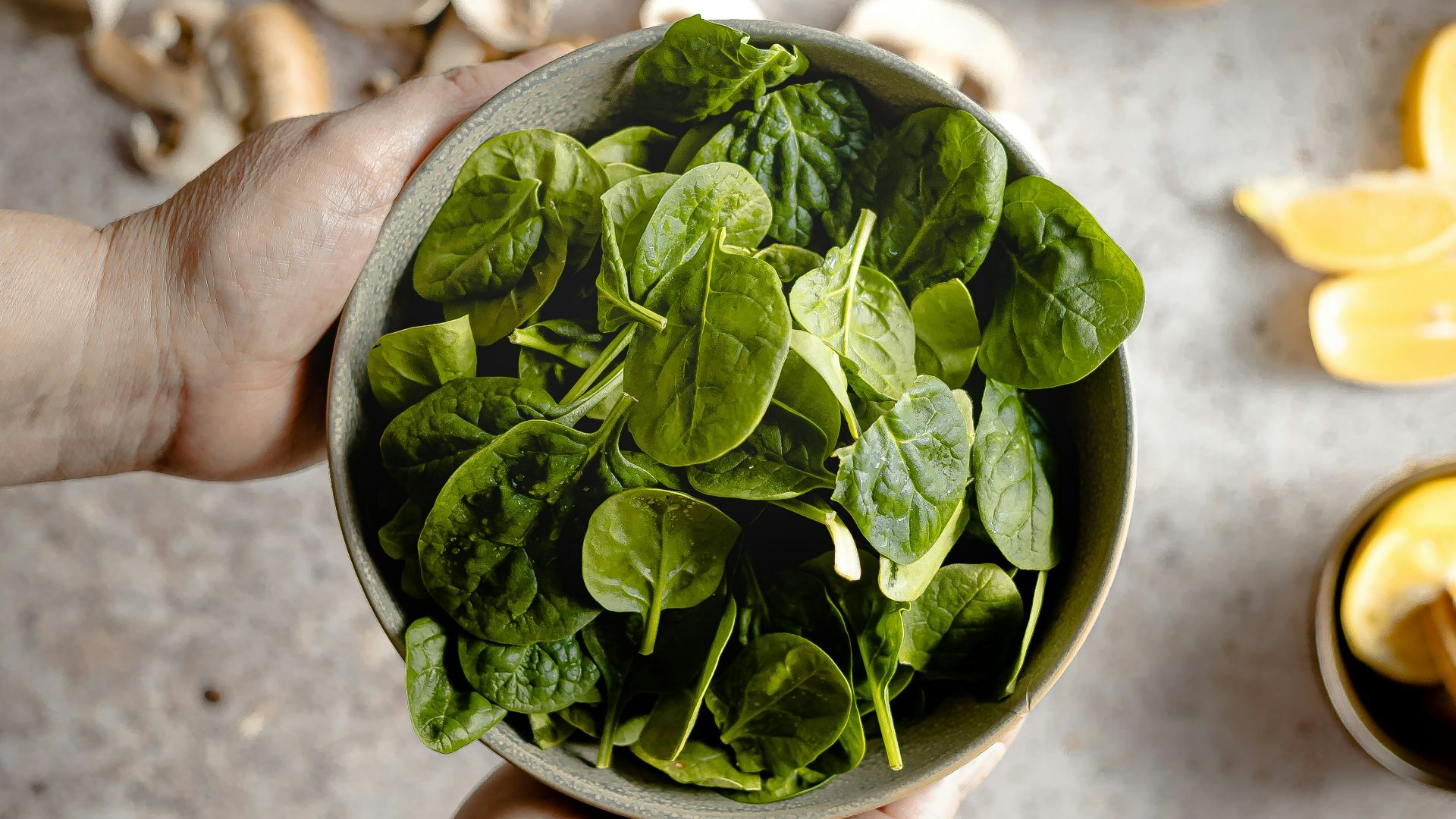 green leaves on white ceramic bowl