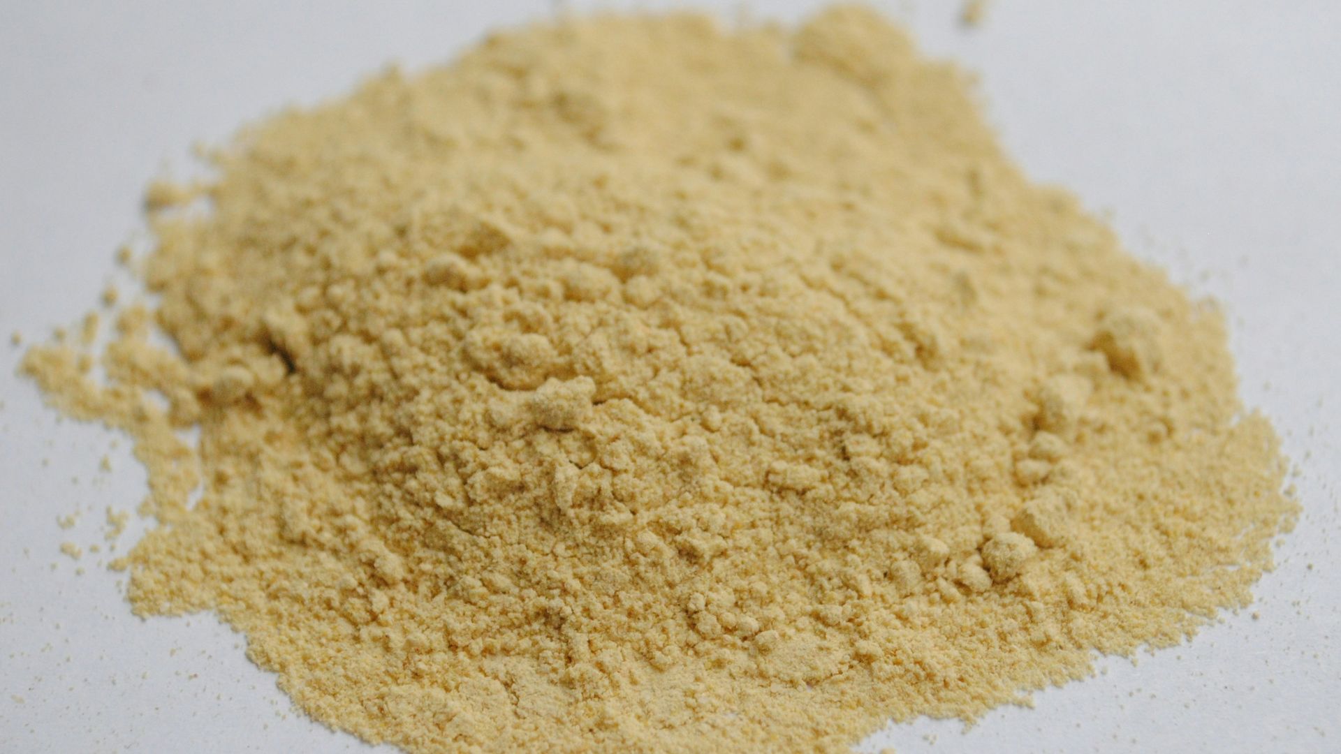 brown powder on white surface