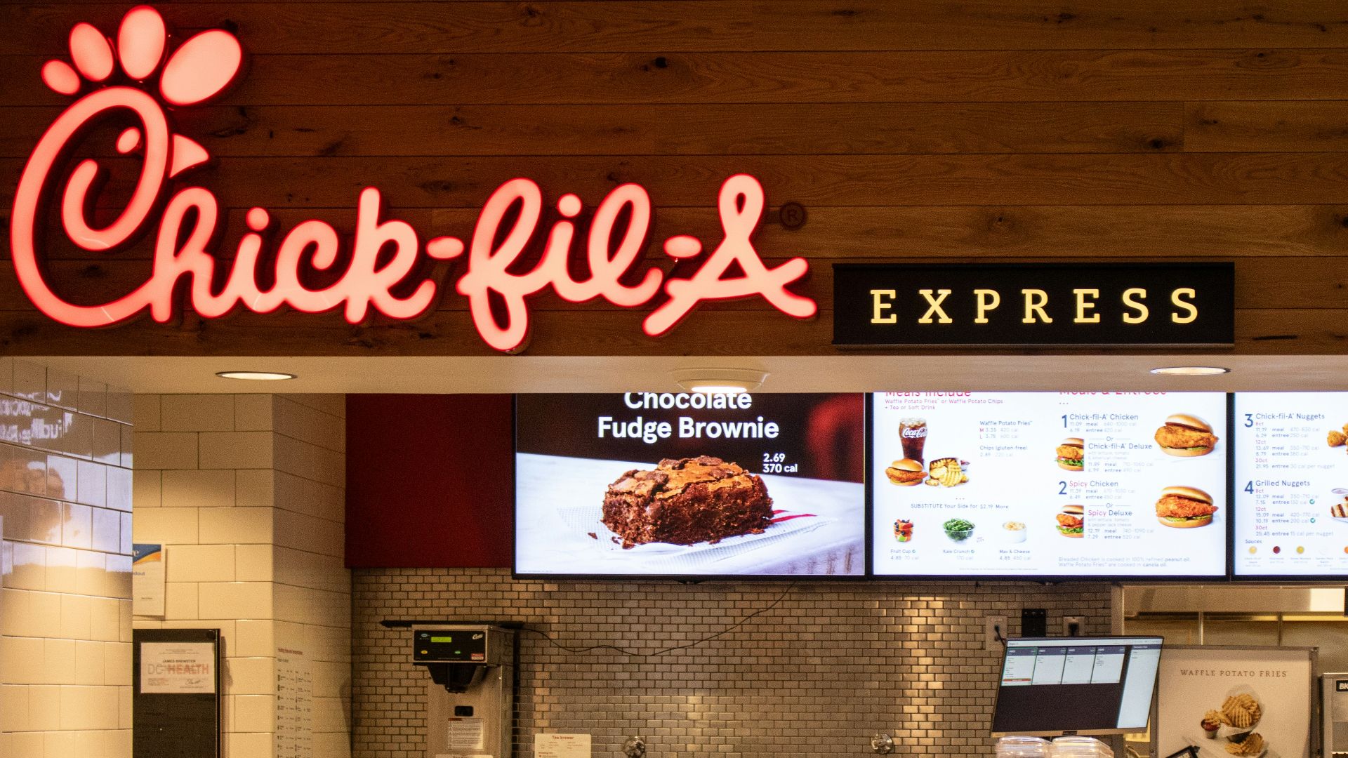 a fast food restaurant with a large menu