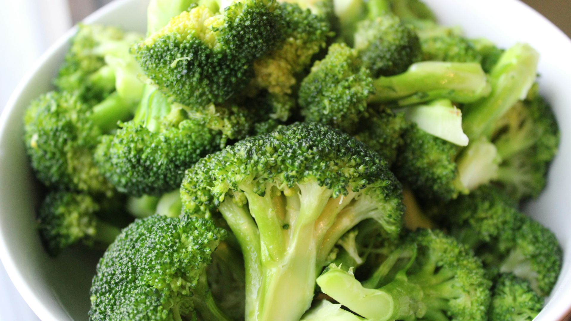 green broccoli on white ceramic plate
