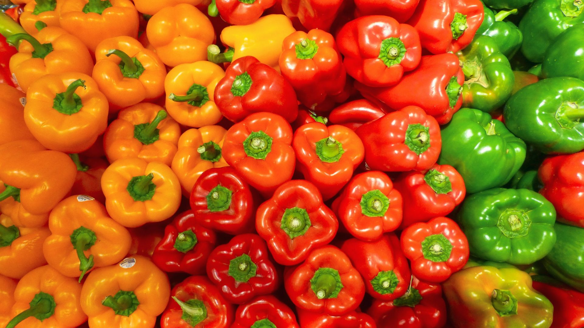 orange bell peppers on white ceramic plate