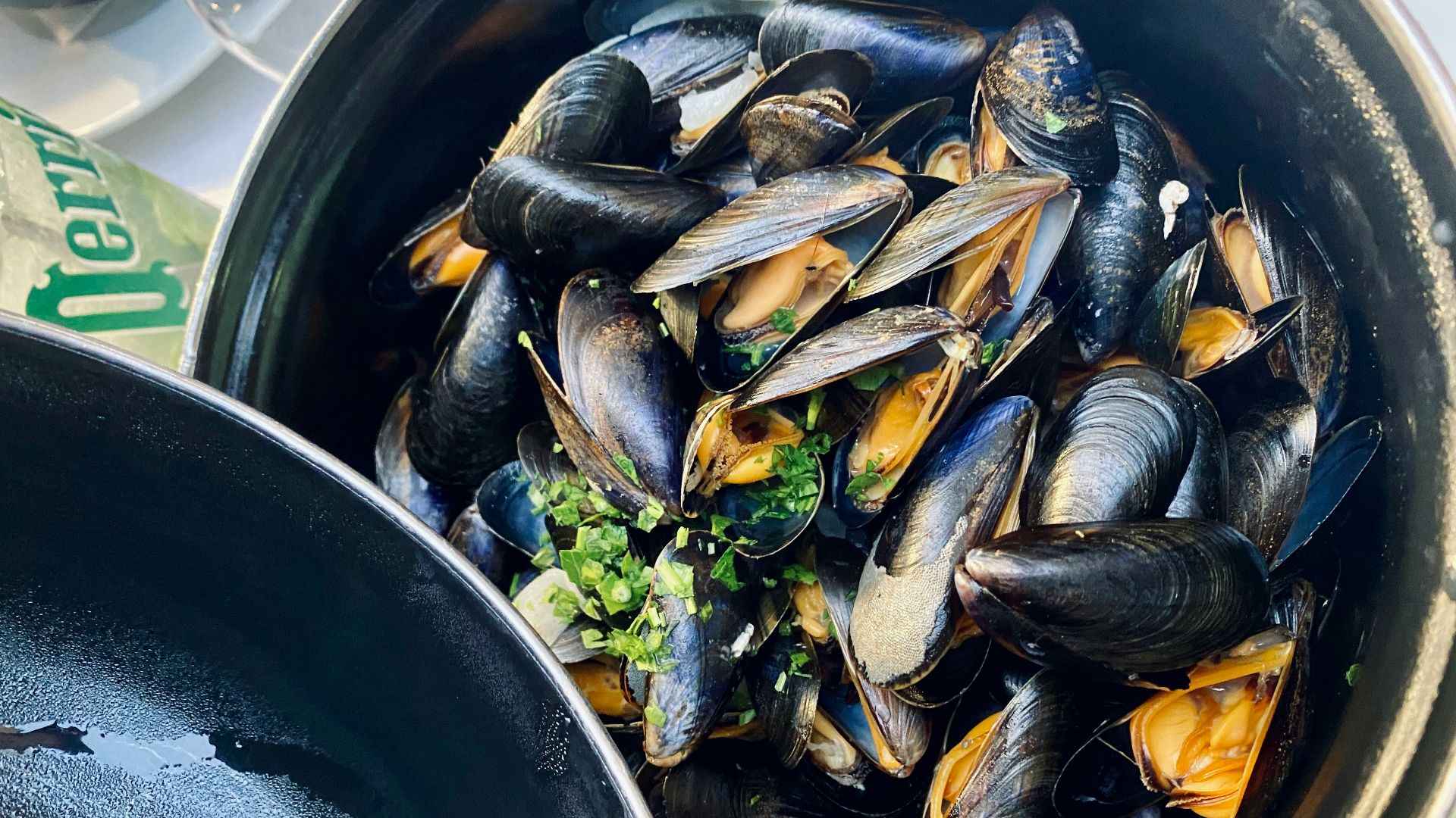 black fish on black round container