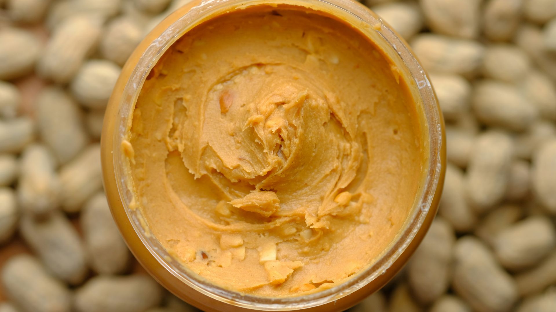 brown powder in brown round container