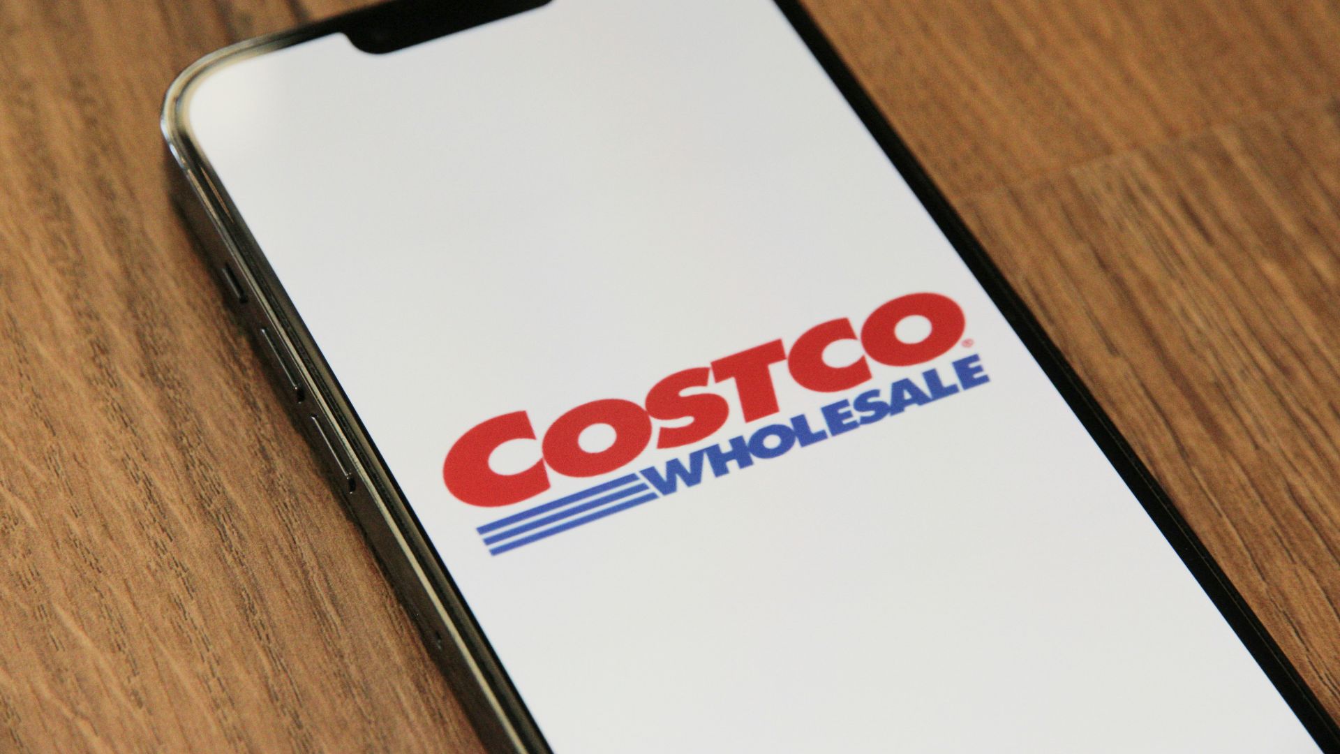 a close up of a cell phone on a table