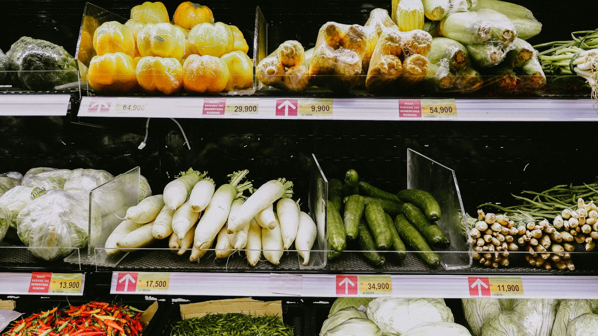yellow and green vegetables on white shelf