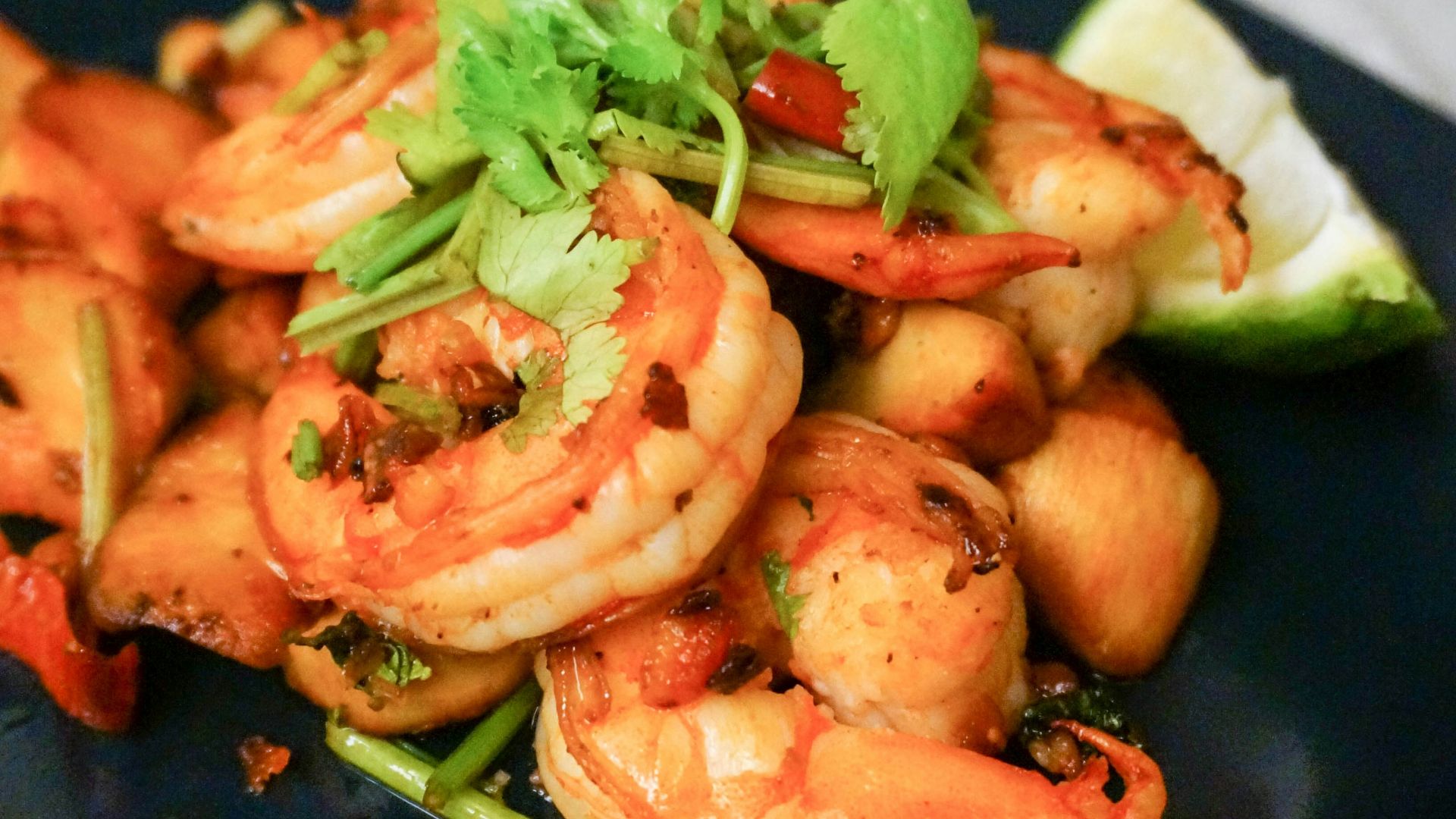 cooked shrimps on blue ceramic plate