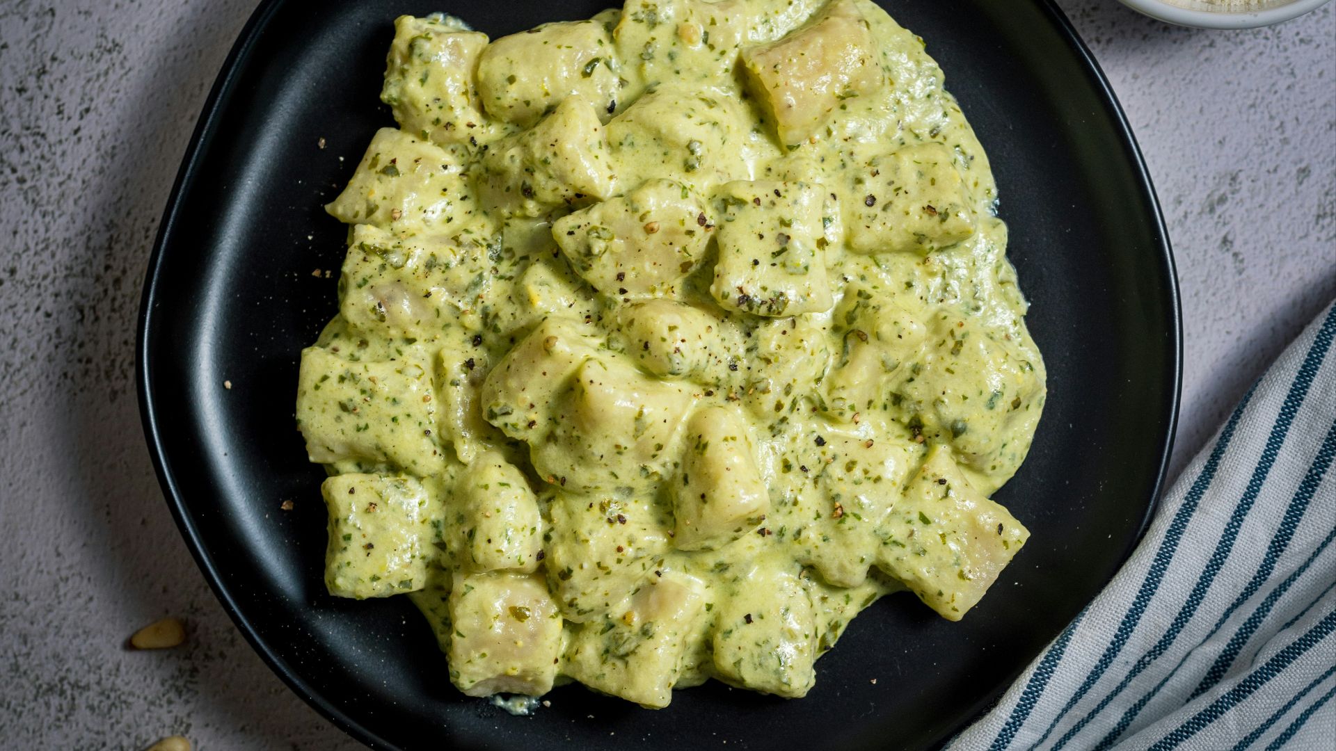 black ceramic plate with food