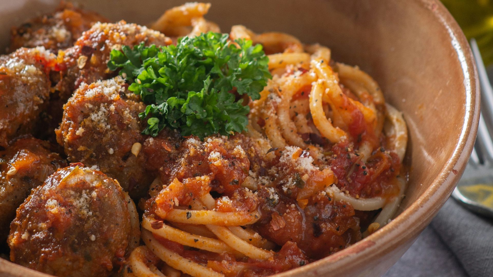 pasta dish in stainless steel bowl