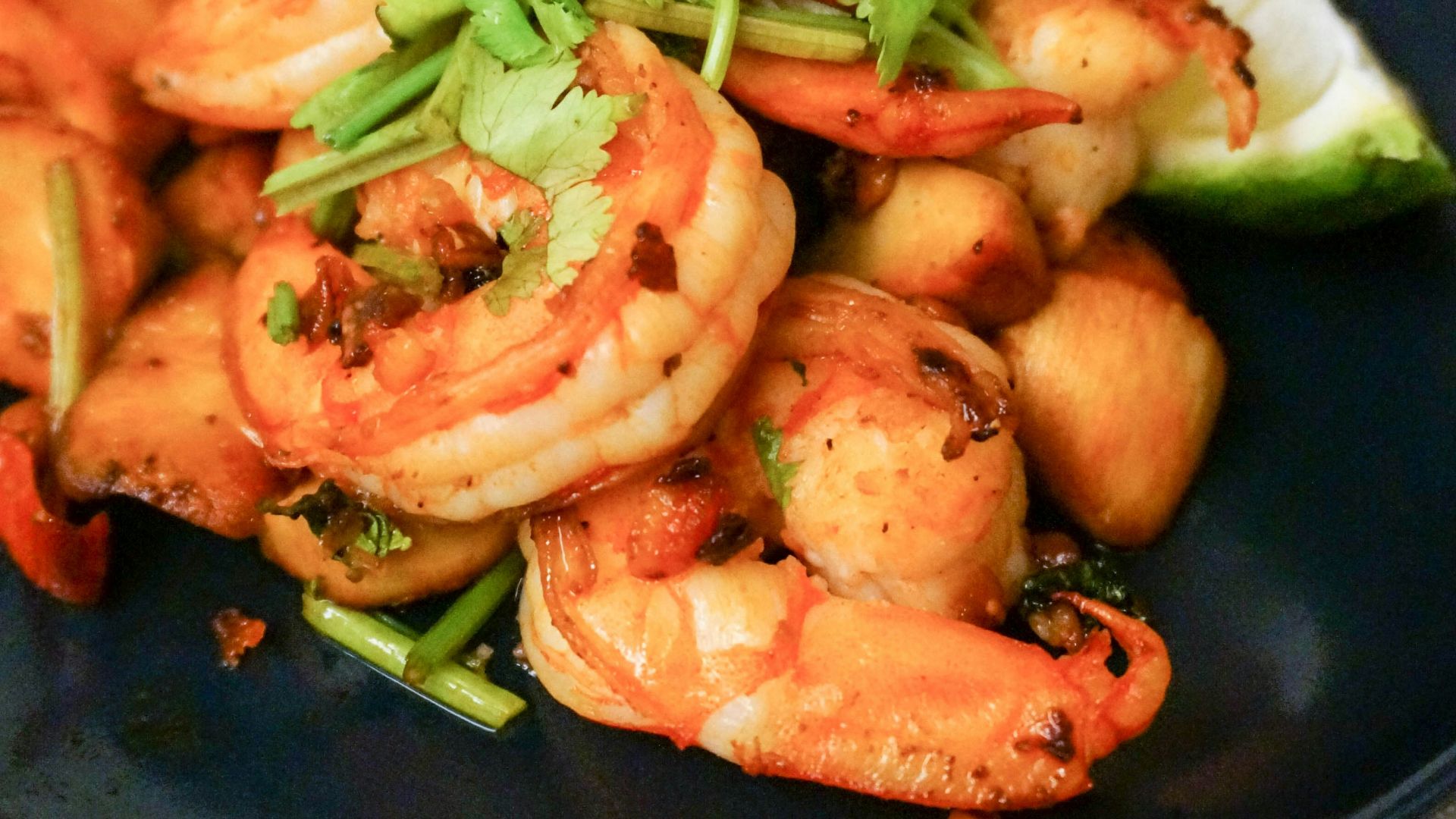cooked shrimps on blue ceramic plate