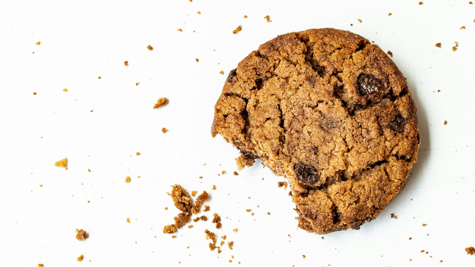brown round cookie on white surface