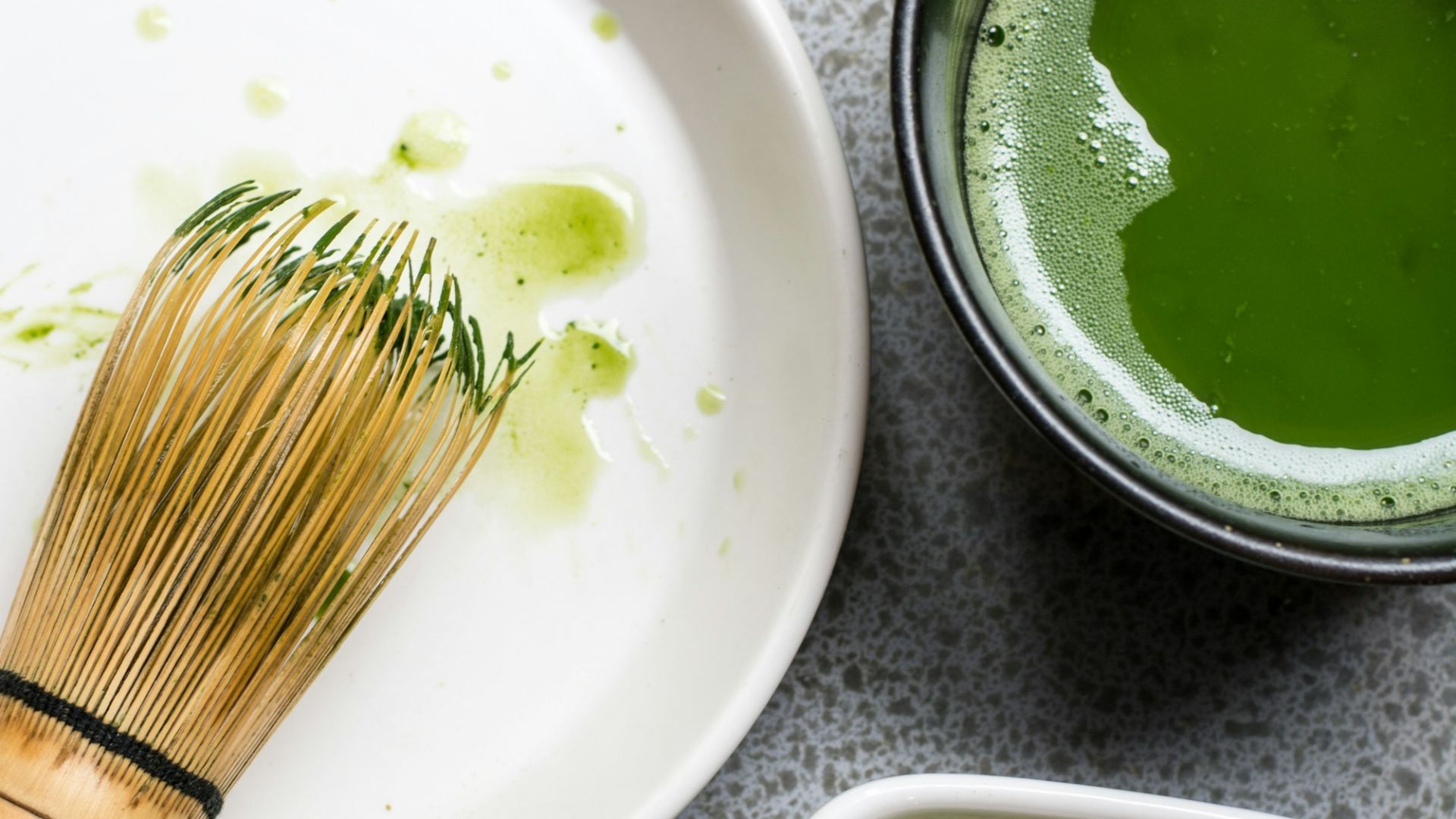 green powder in white bowl