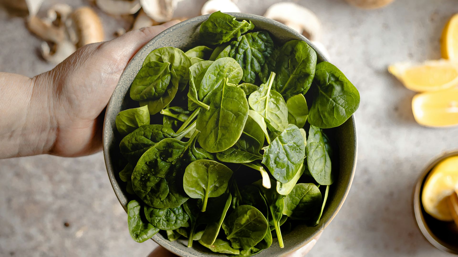 green leaves on white ceramic bowl