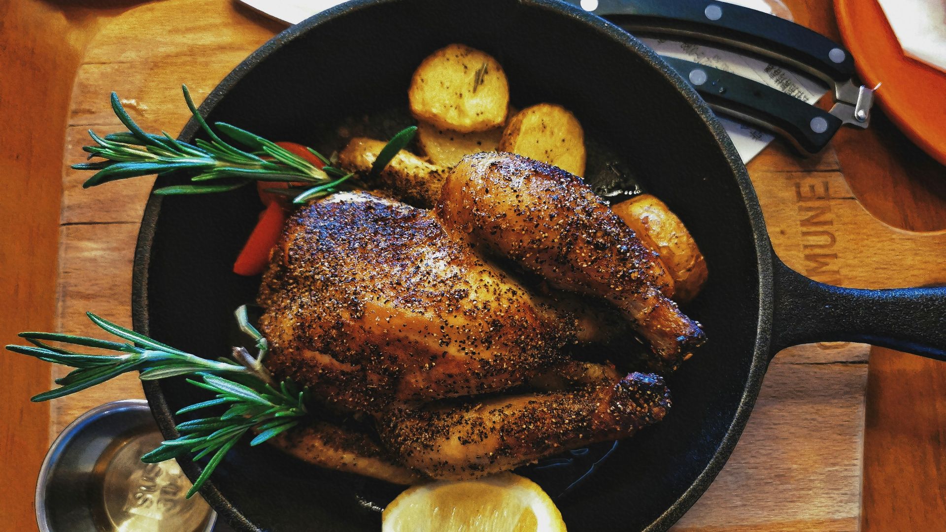grilled meat on black round plate