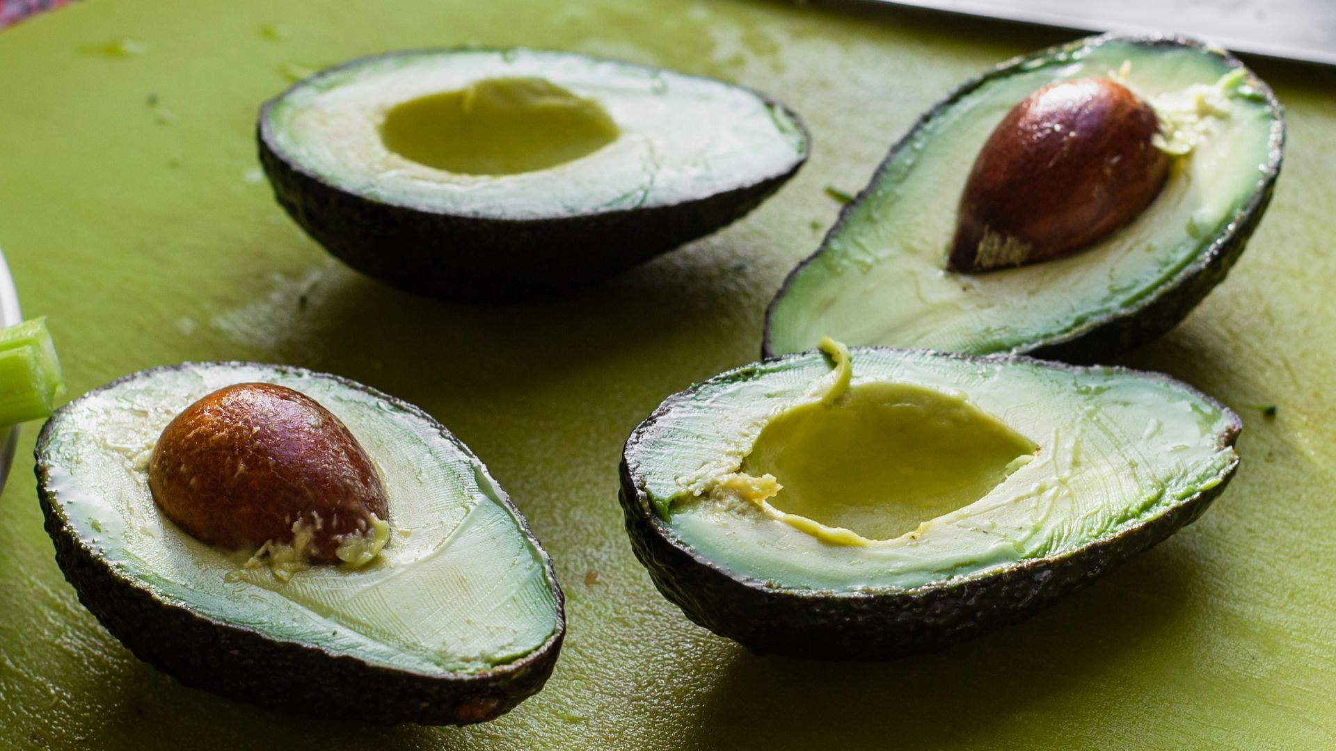 sliced avocados on tray