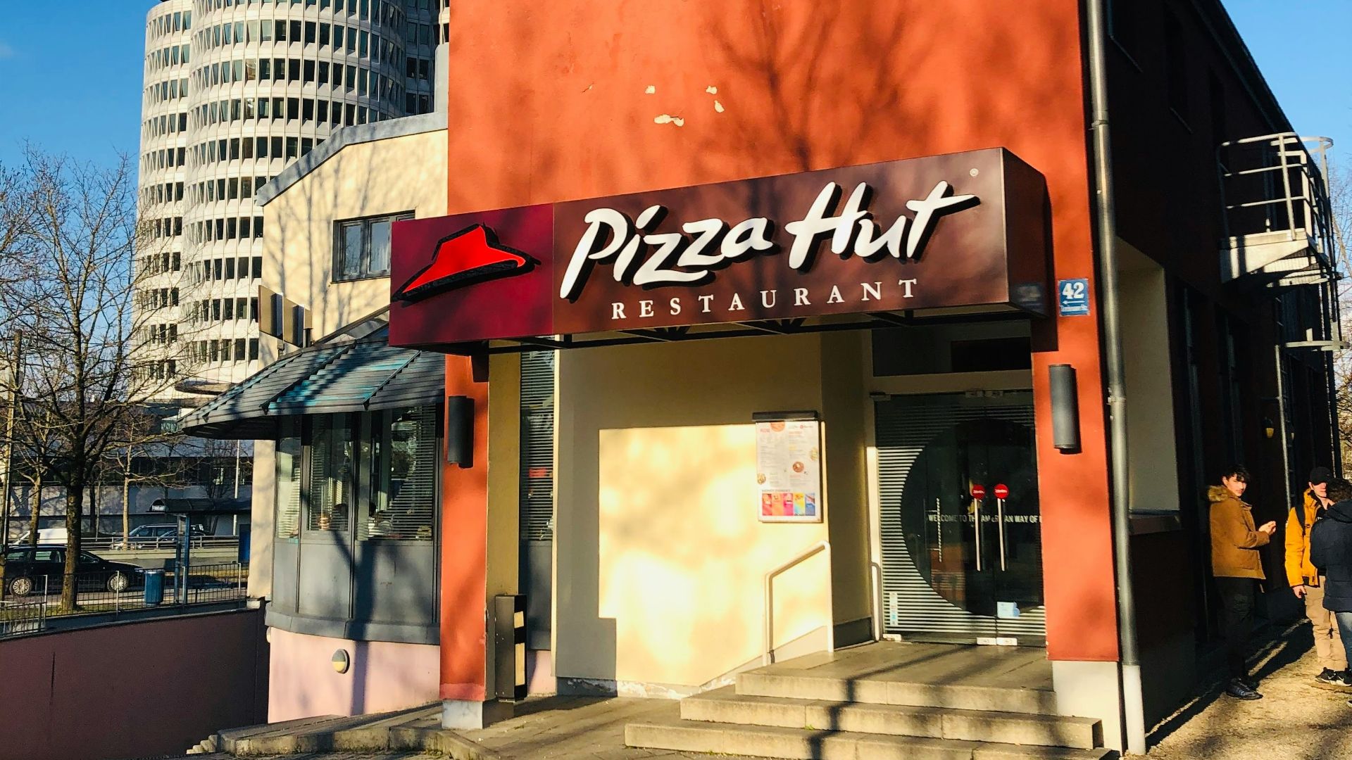 brown and white concrete building during daytime