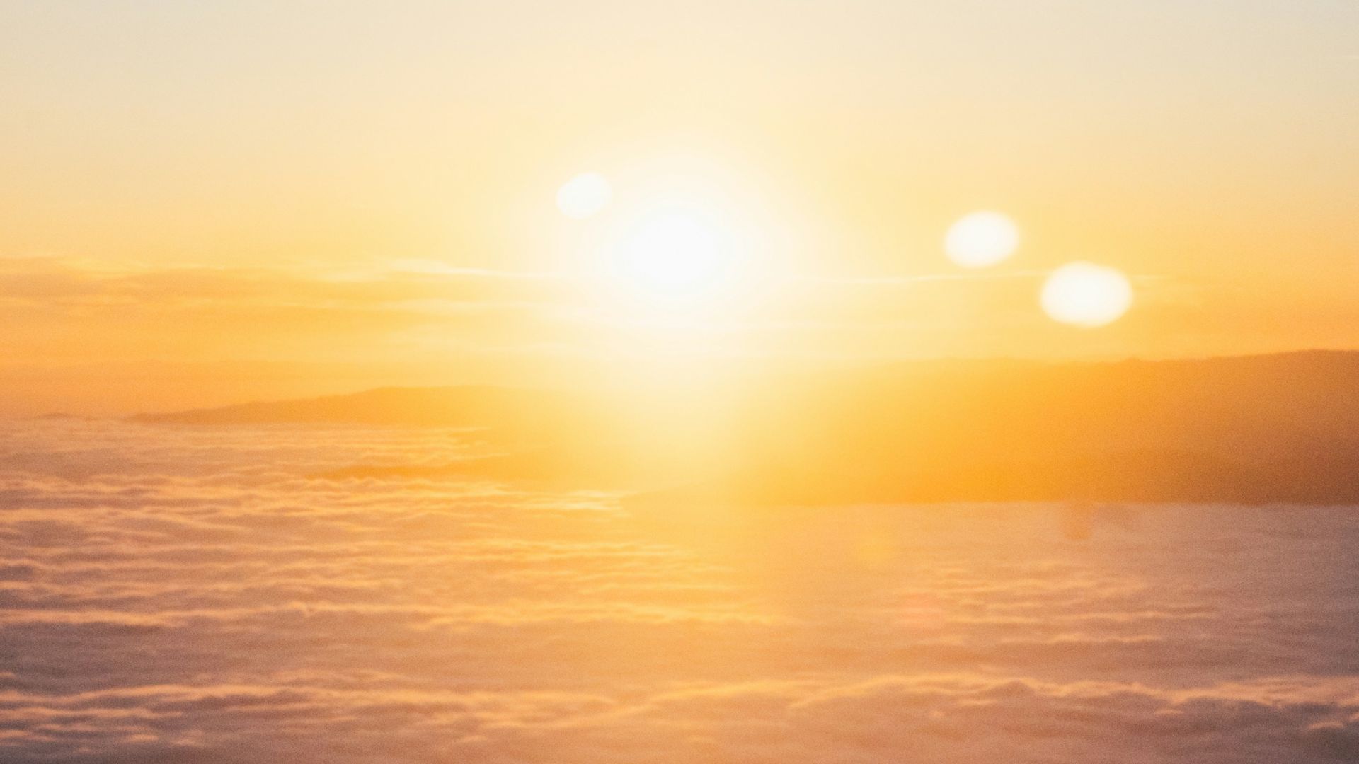clouds and sun during sunset