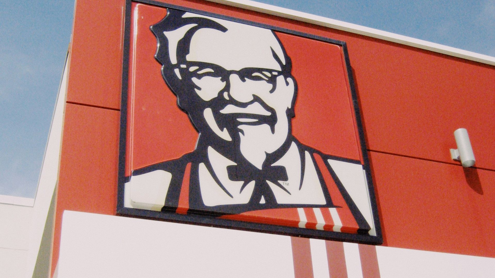 a picture of a man on the side of a building