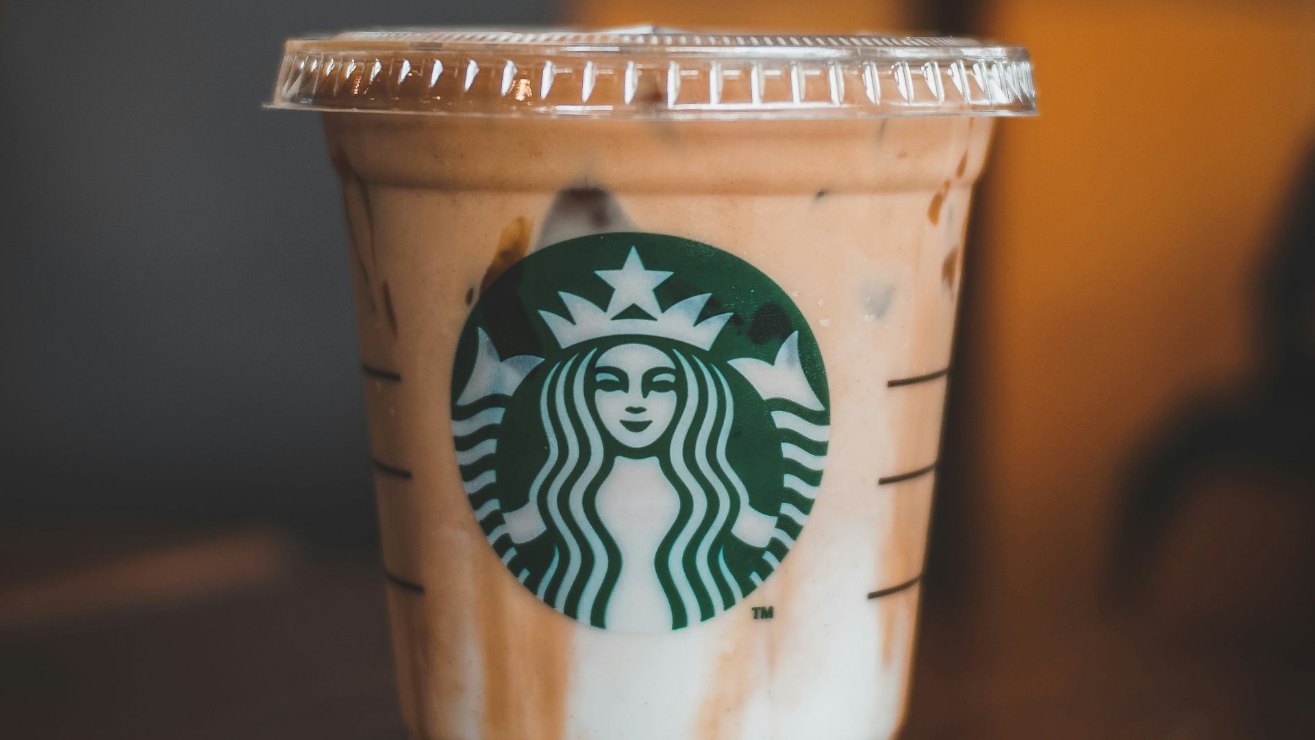 white and brown starbucks cup