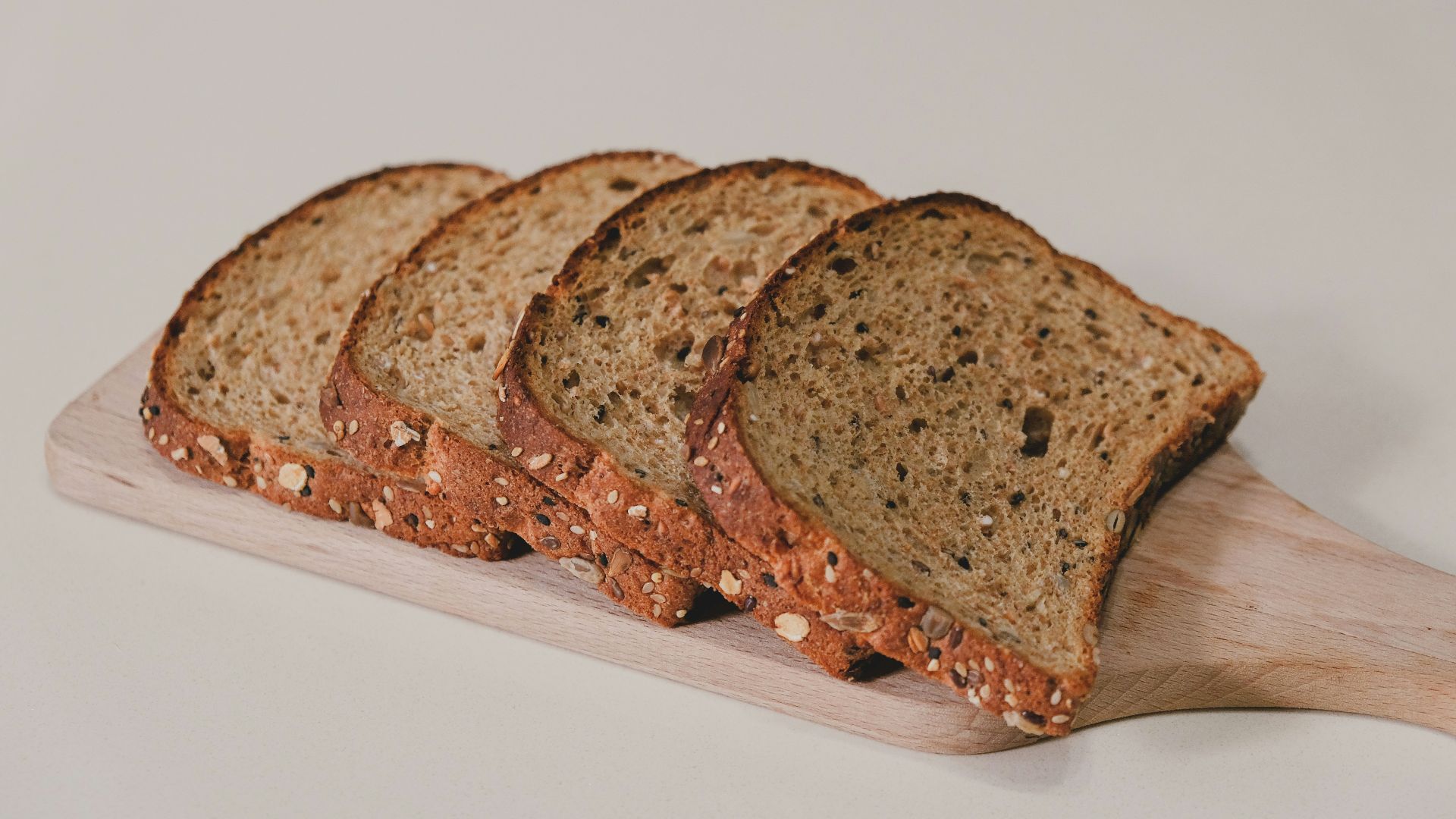 sliced bread on white table