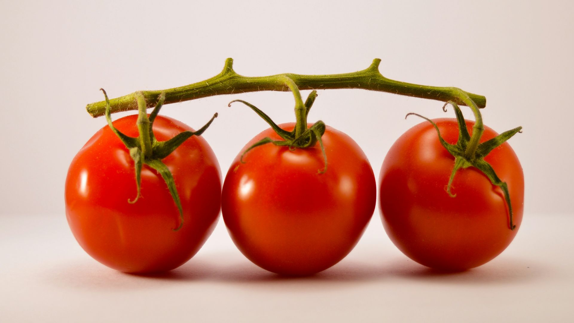 three cherry tomatoes