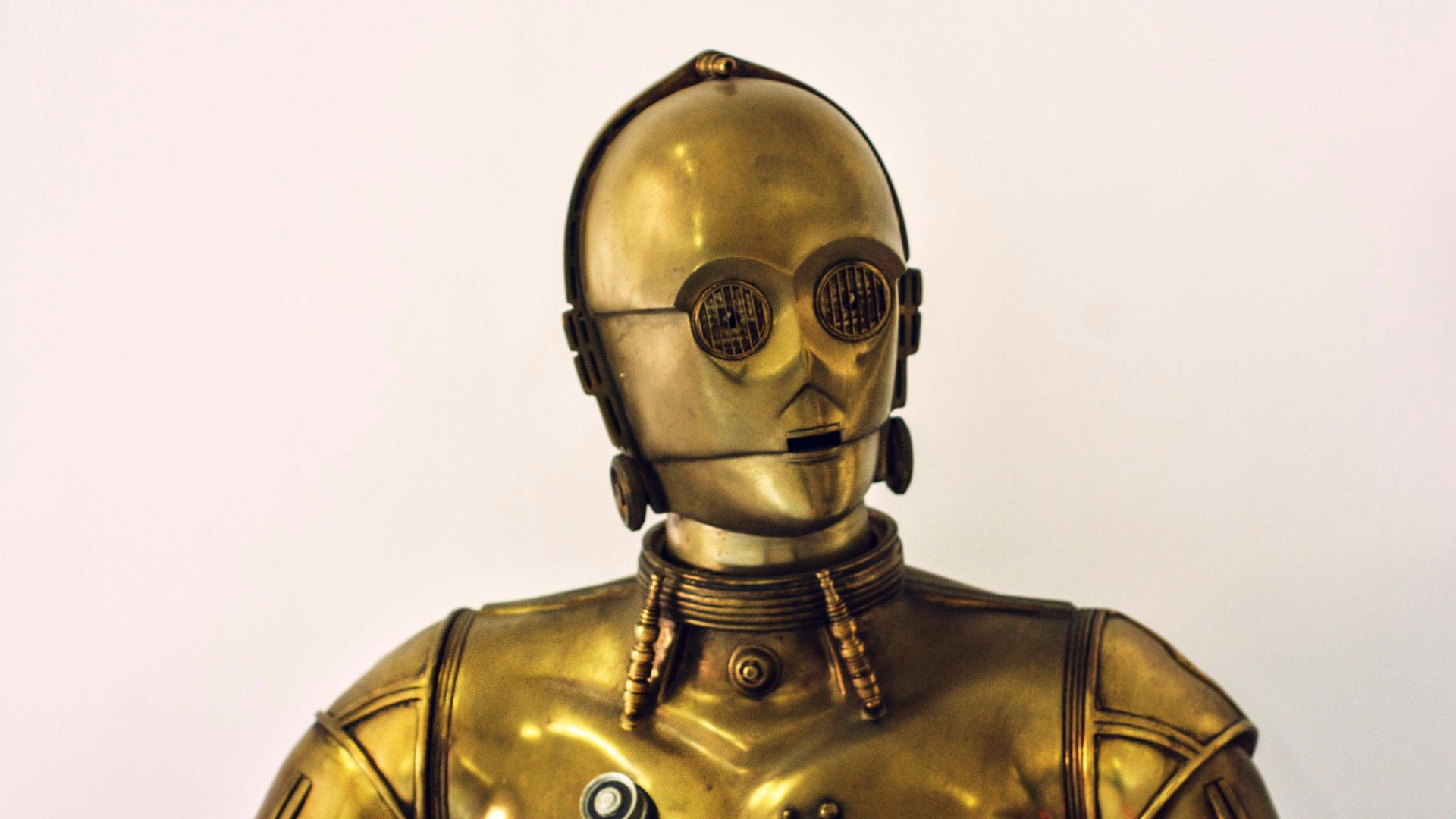 person wearing gold mask and mask