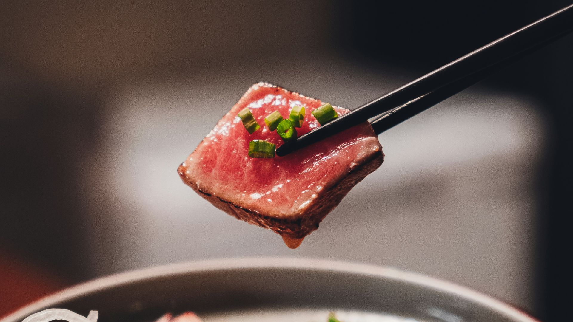 stainless steel fork on white ceramic plate
