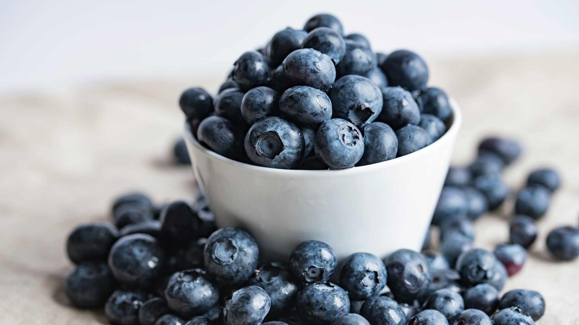blueberries on white ceramic container