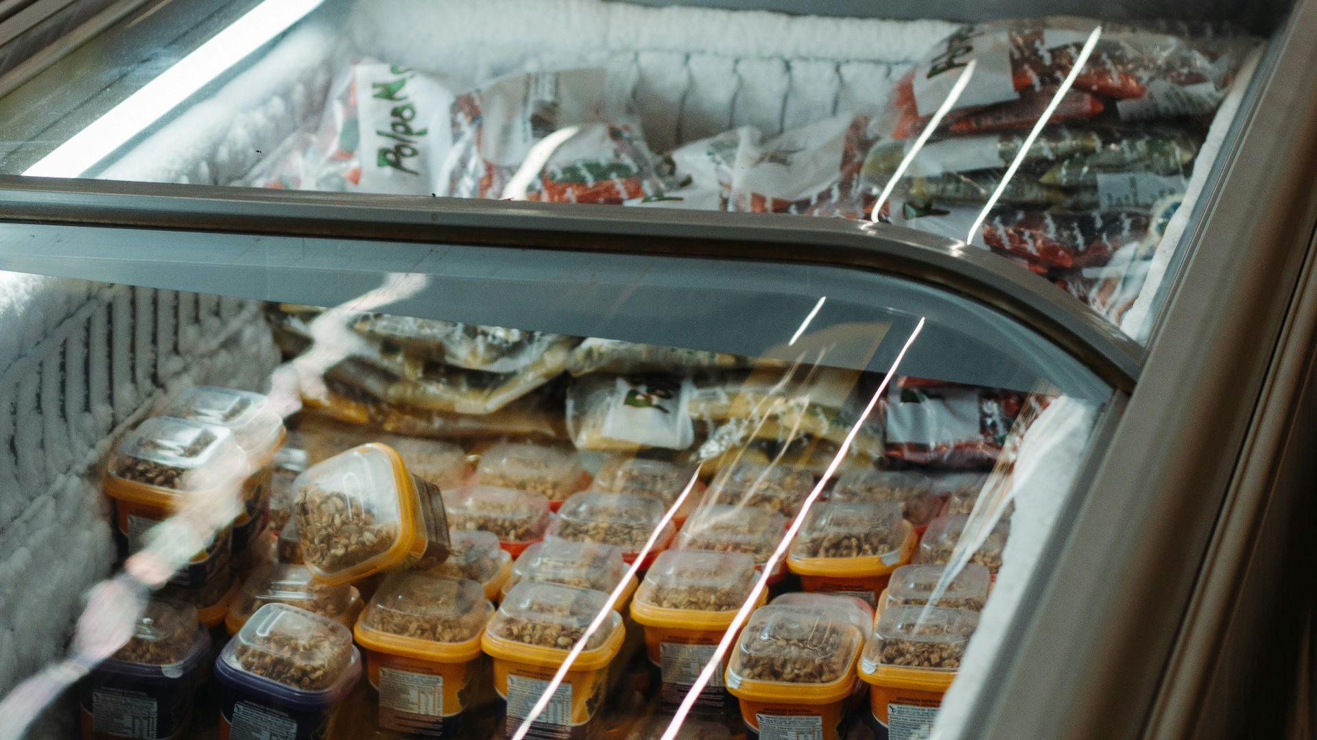 assorted food in silver commercial refrigerator