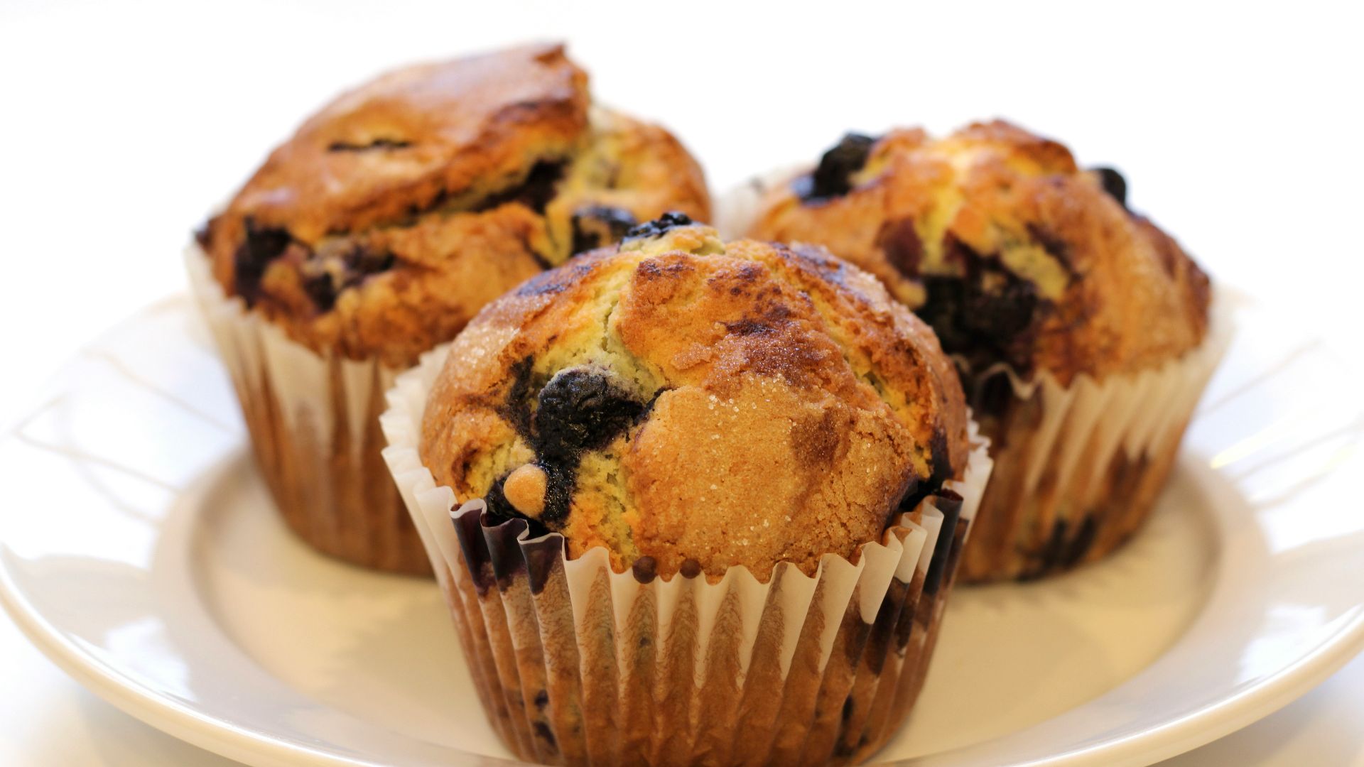 brown cupcakes on white ceramic plate
