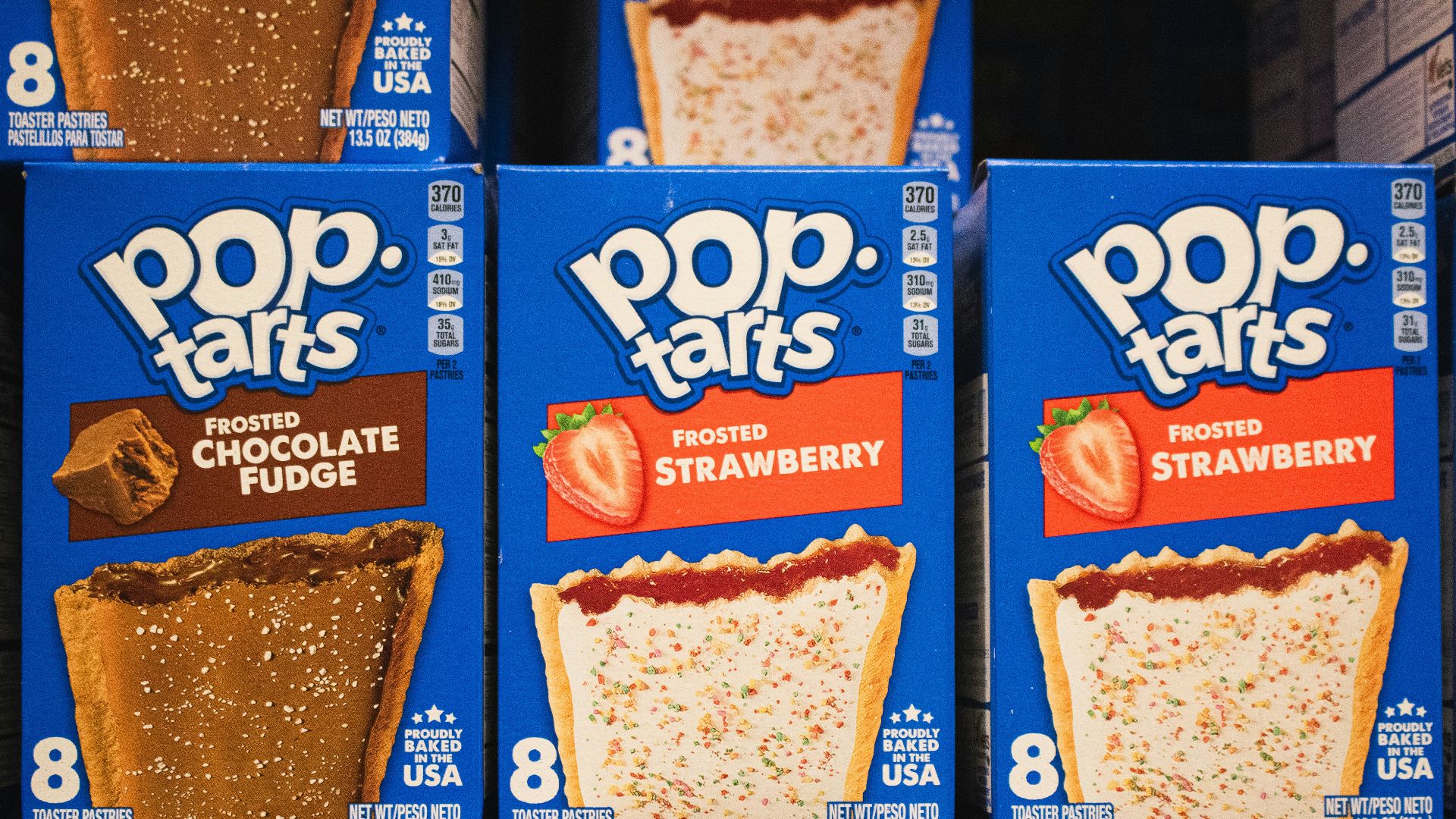 Boxes of pop-tarts are shown with different flavors.