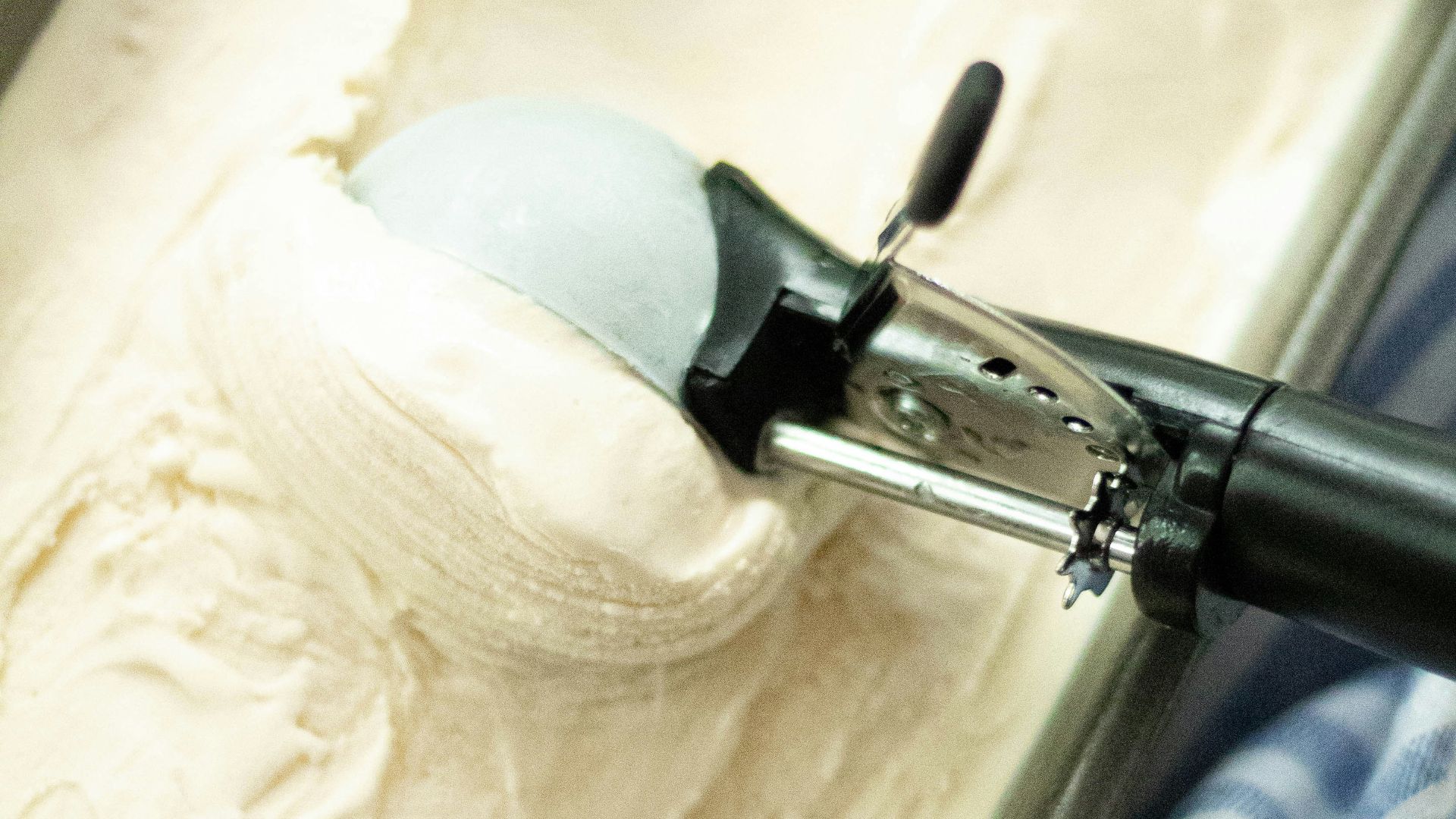 white and gray textile on white ceramic sink