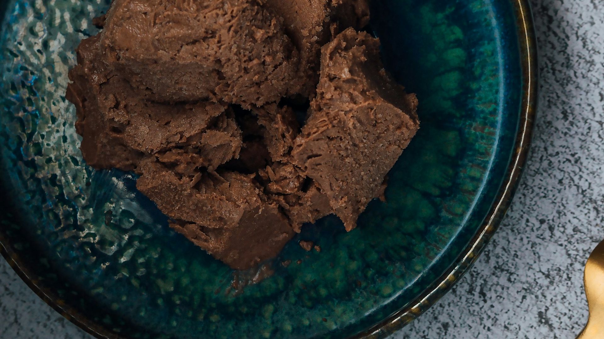 brown food on blue round plate