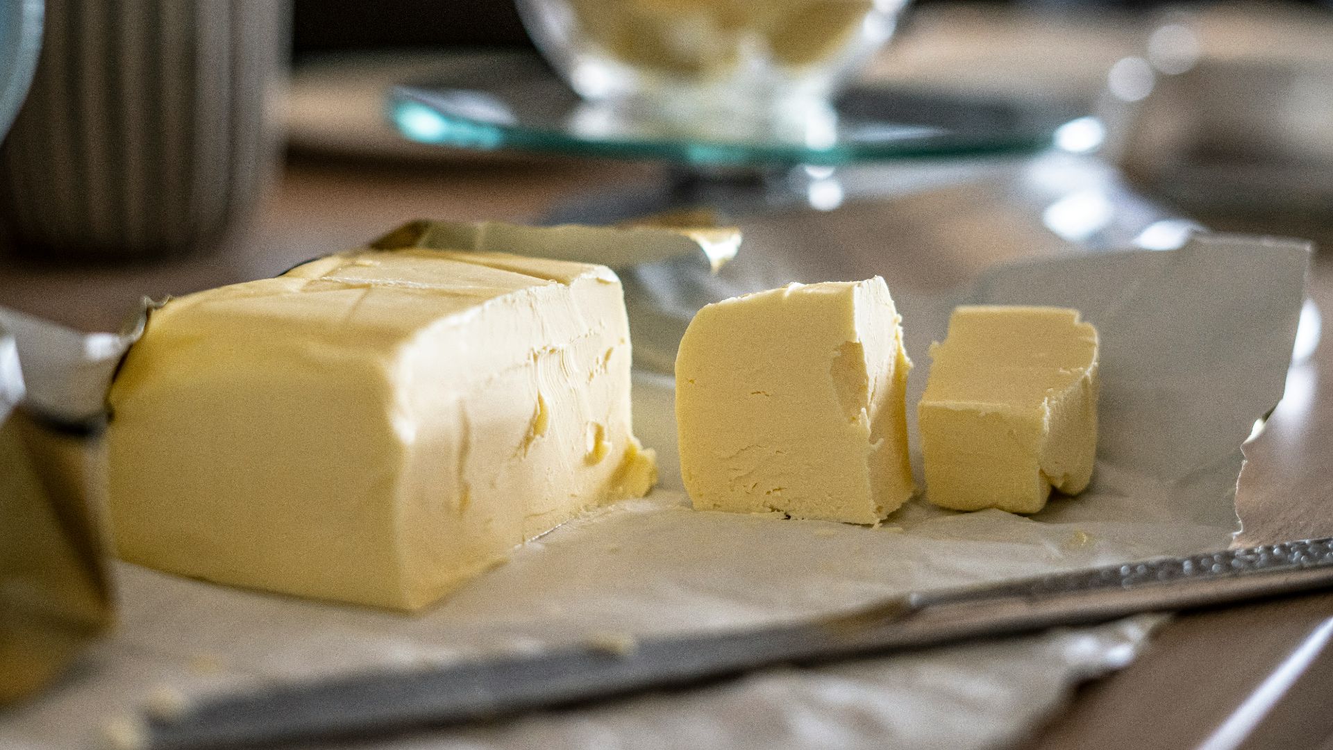 sliced cheese on clear glass plate