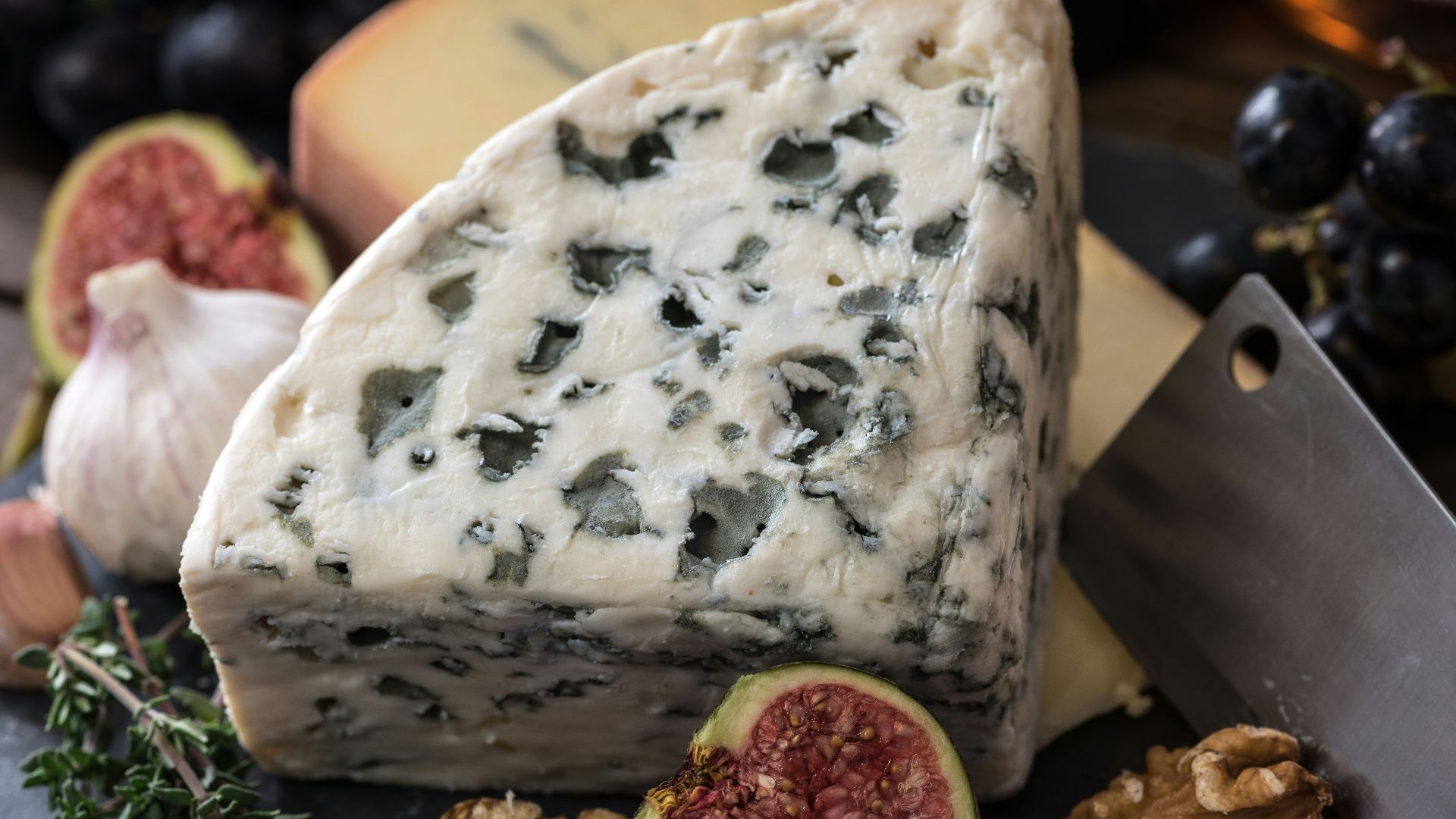 bolognese cheese beside herbs