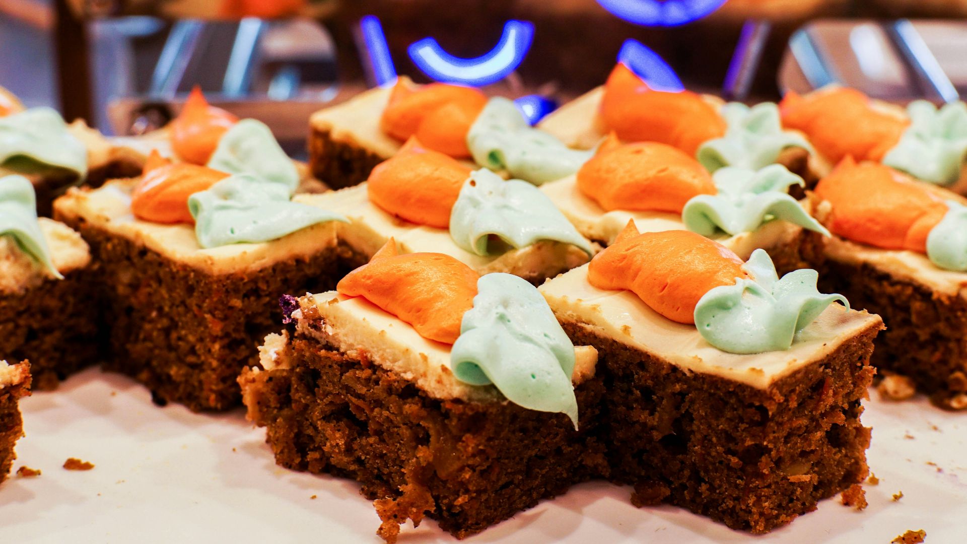 brown bread with sliced tomato and green vegetable on white ceramic plate
