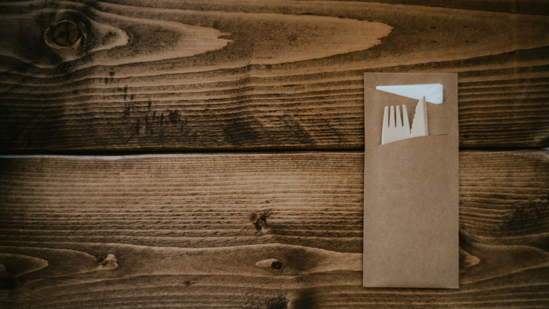 a white box on a wooden surface