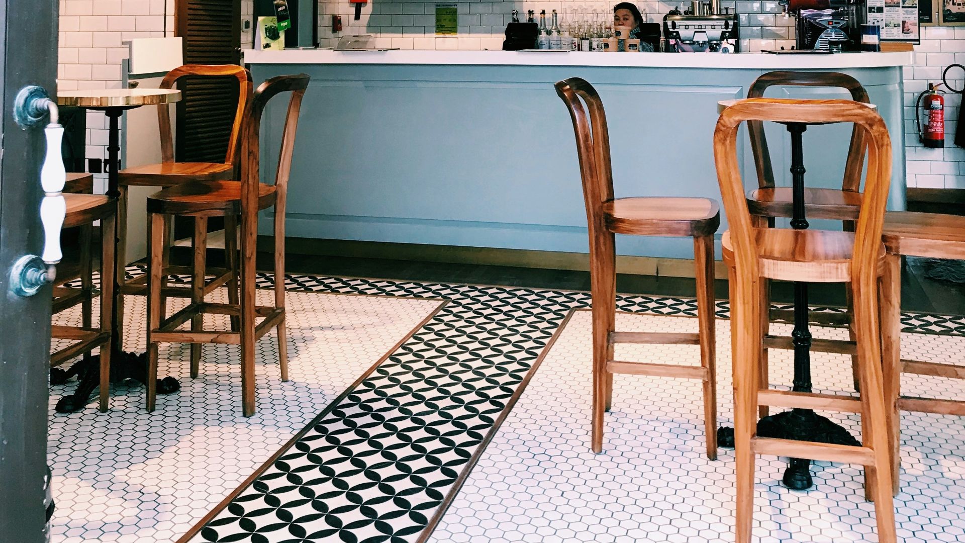 brown wooden chairs and tables