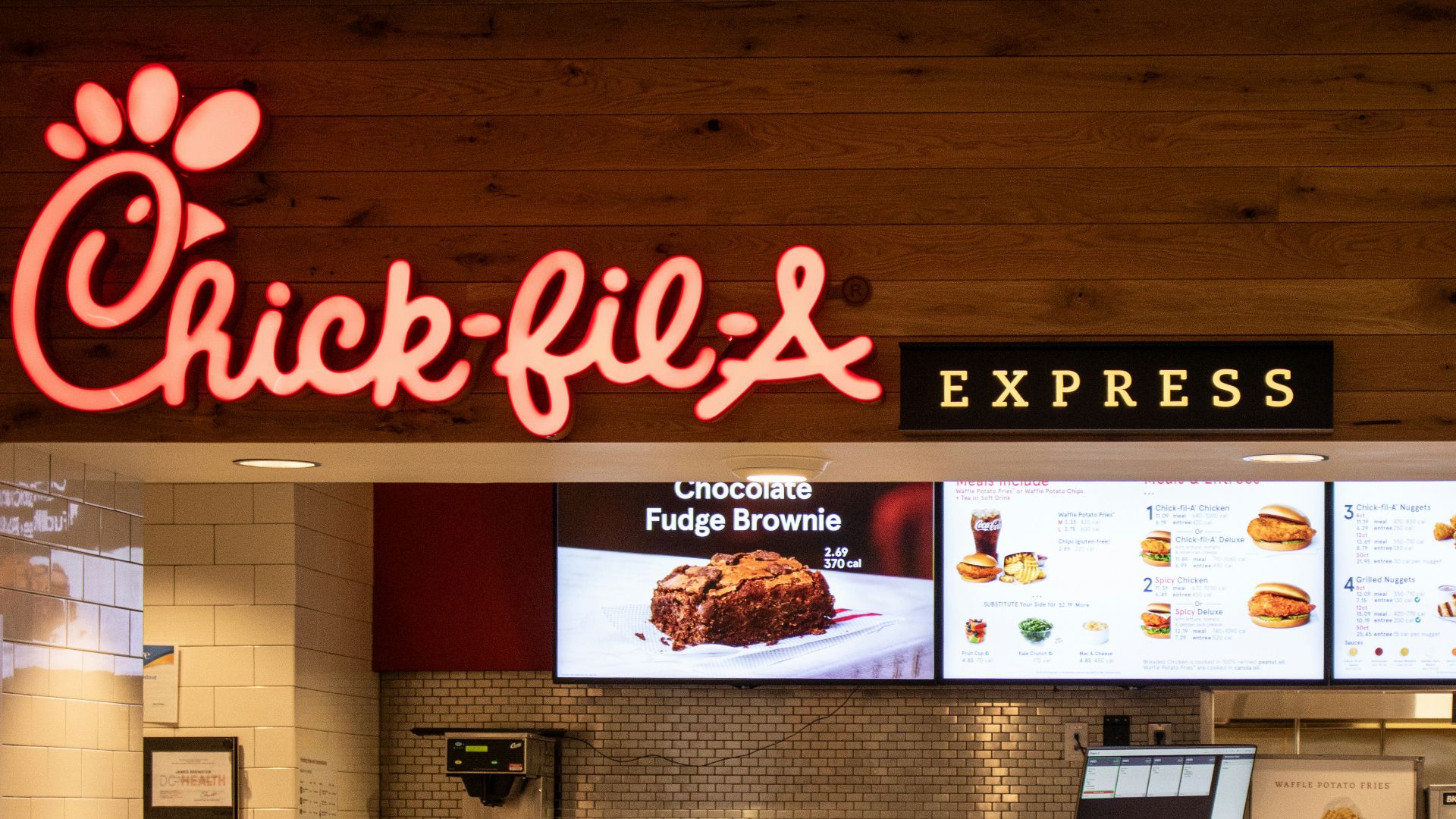 a fast food restaurant with a large menu