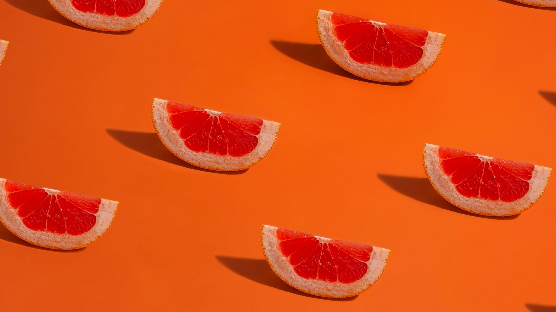 orange and white floral textile