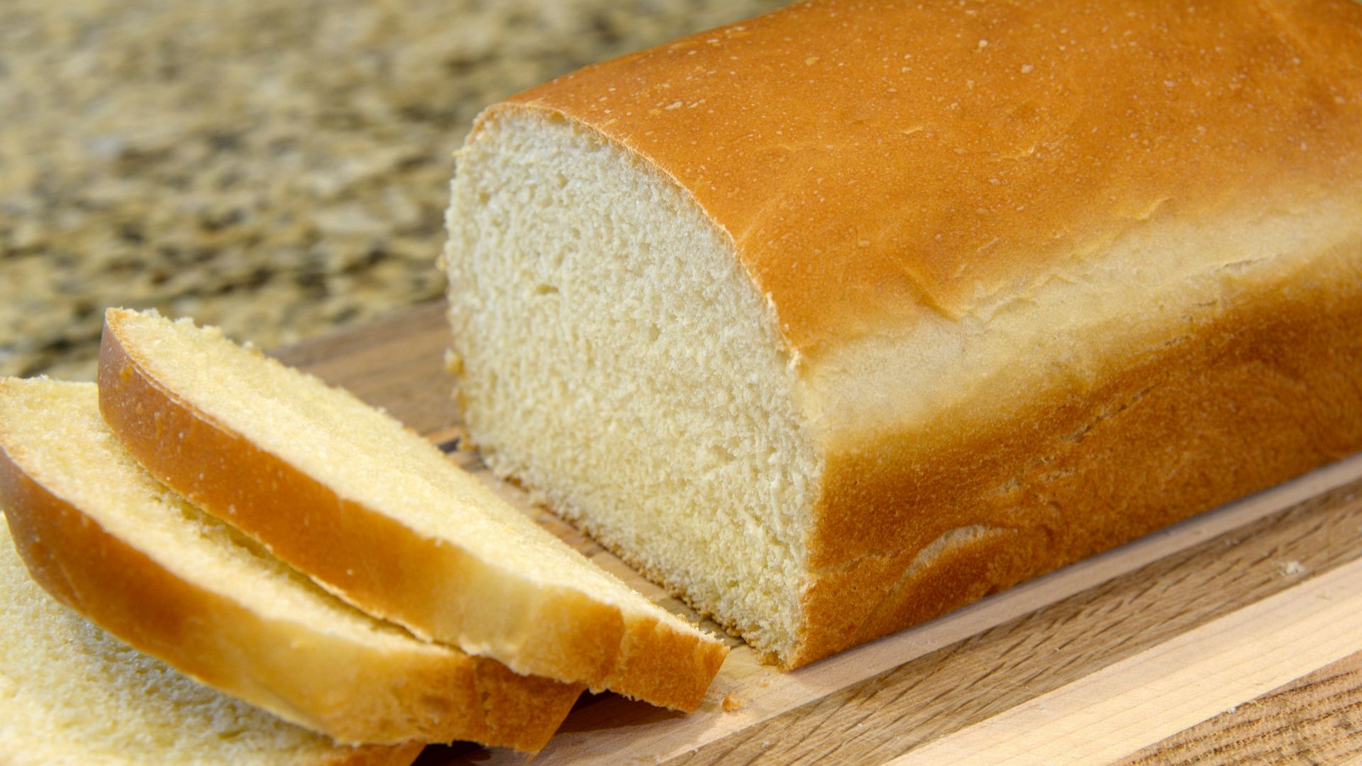 bread on brown wooden chopping board