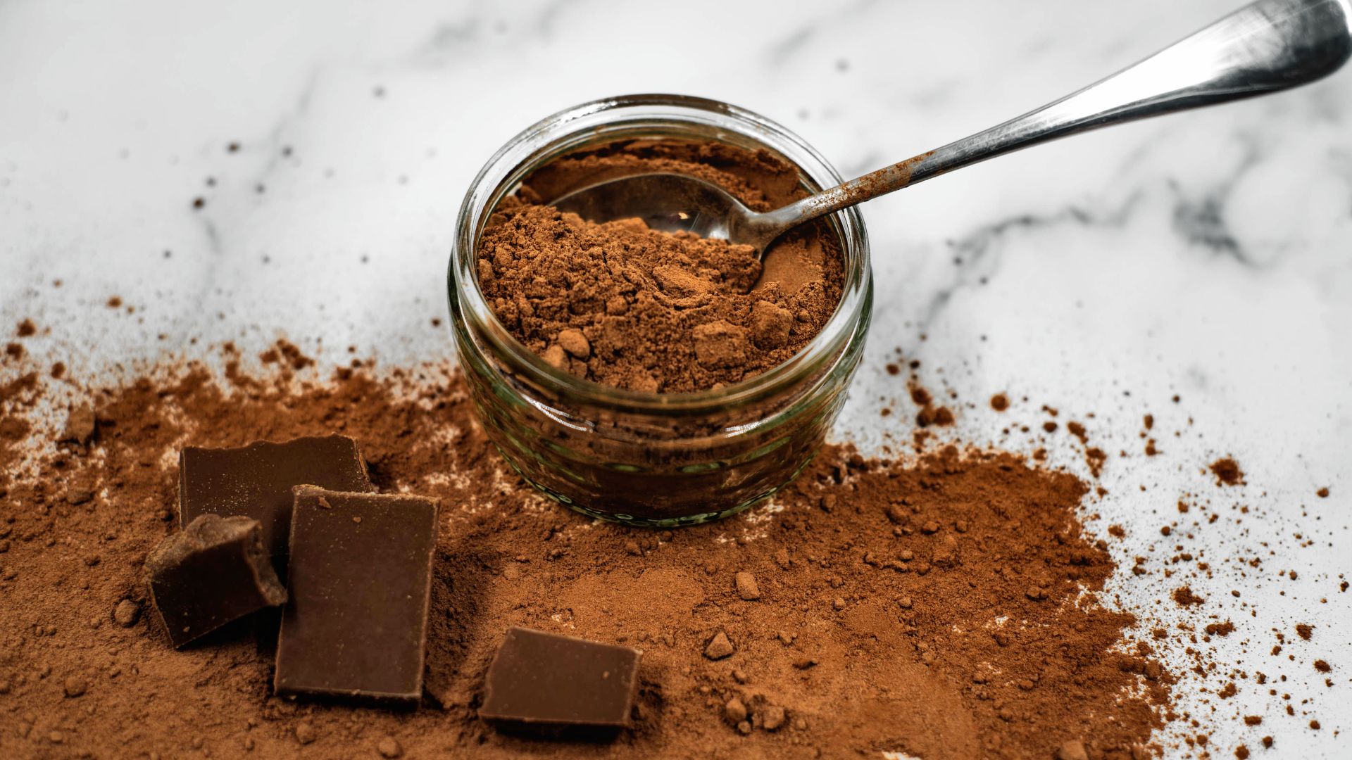 File:Cocoa Powder and Chocolate on Marble Background.jpg
