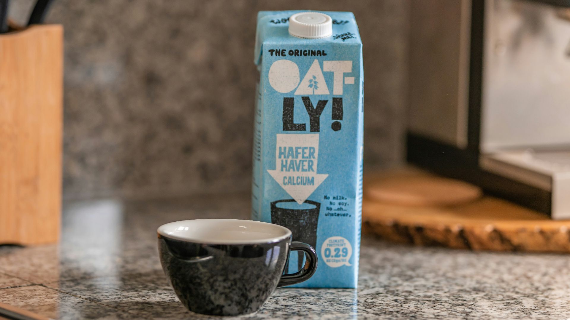 blue and white carton box on gray marble table
